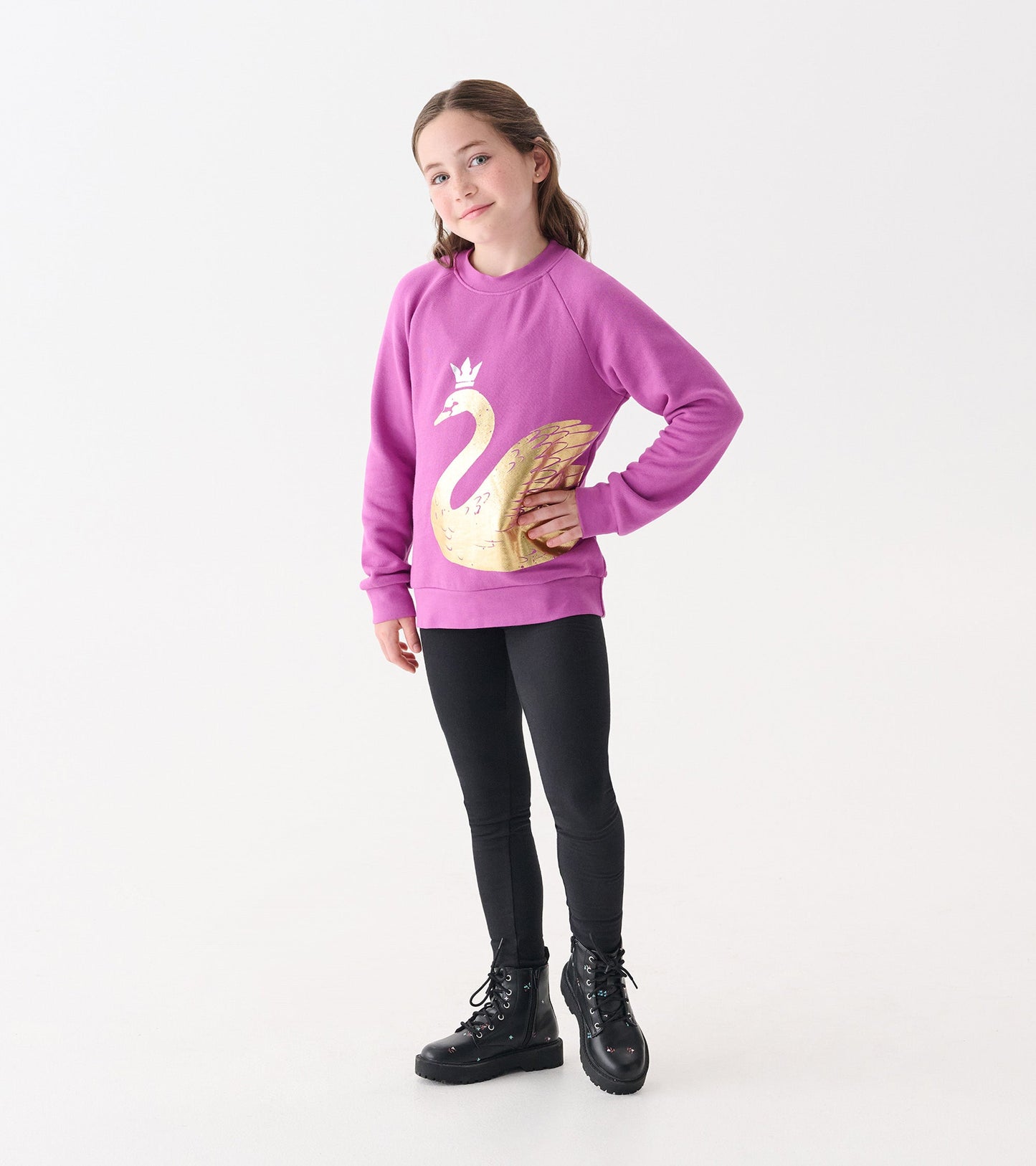 Black cozy leggings for girls, featuring a slim fit, ideal for casual wear or layering.