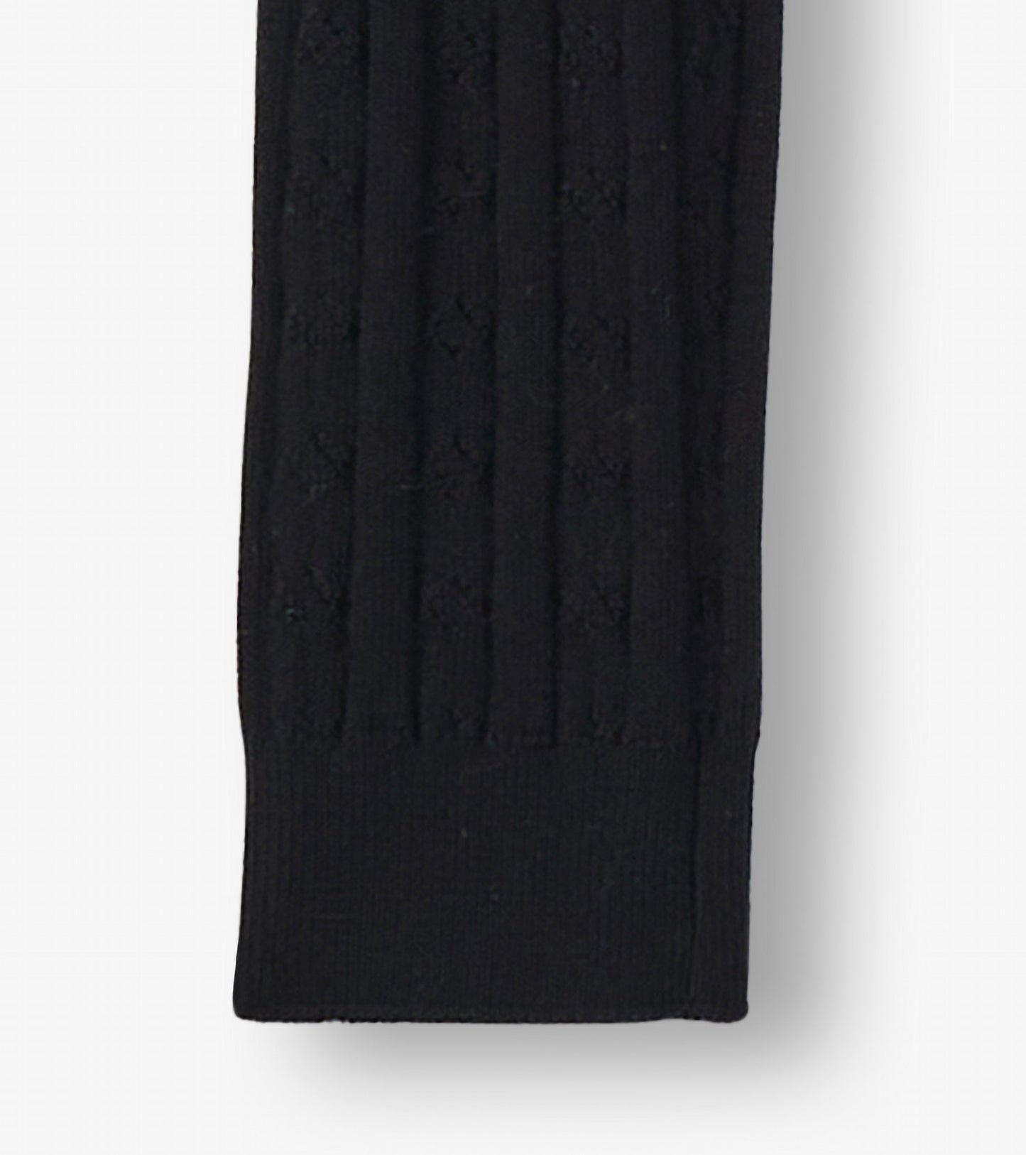 Black cable knit leggings with a textured pattern, designed for girls, featuring a snug fit at the ankle.
