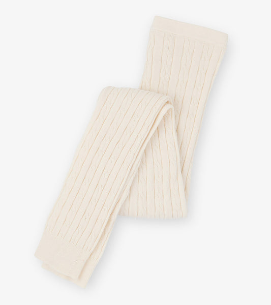 Cream cable knit tights with a textured pattern, suitable for girls, folded neatly.