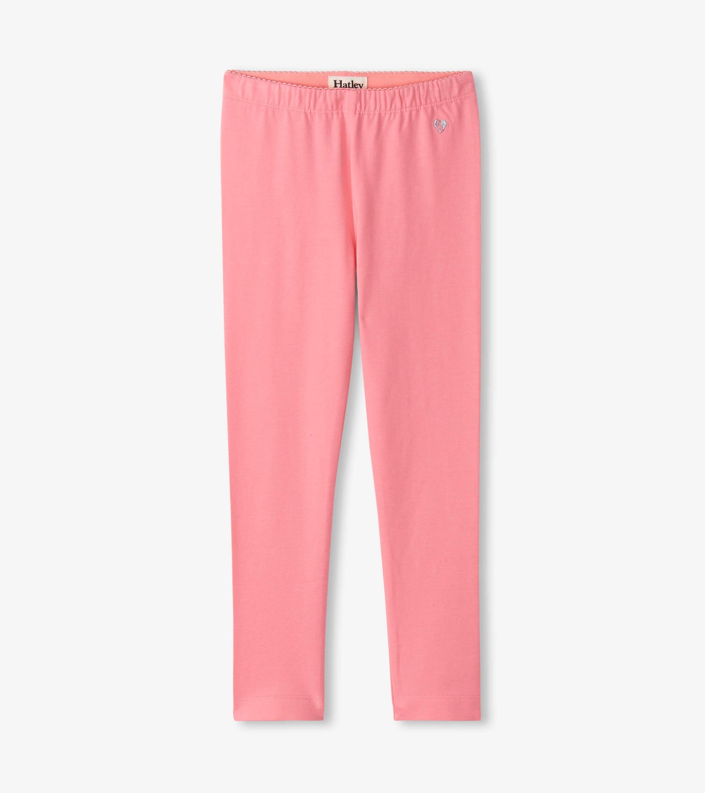 Pink leggings with an elastic waistband and a small heart detail, suitable for casual wear.