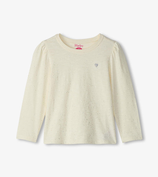Cream long sleeve graphic tee with subtle glitter accents and a small heart design on the chest.