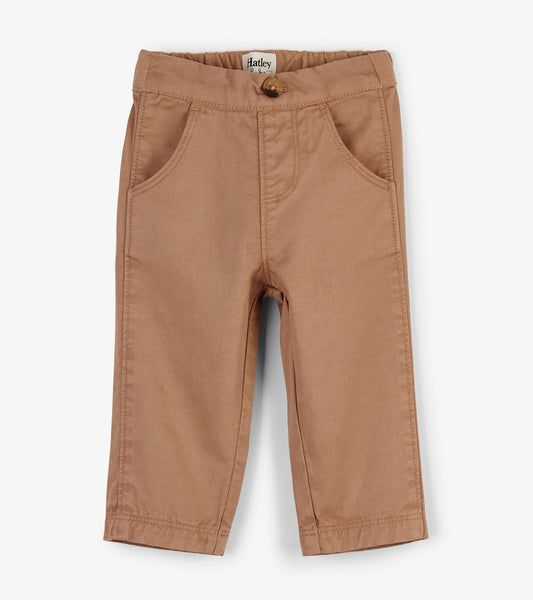 Khaki twill baby pants with a button closure and front pockets, suitable for infants aged 3-24 months.