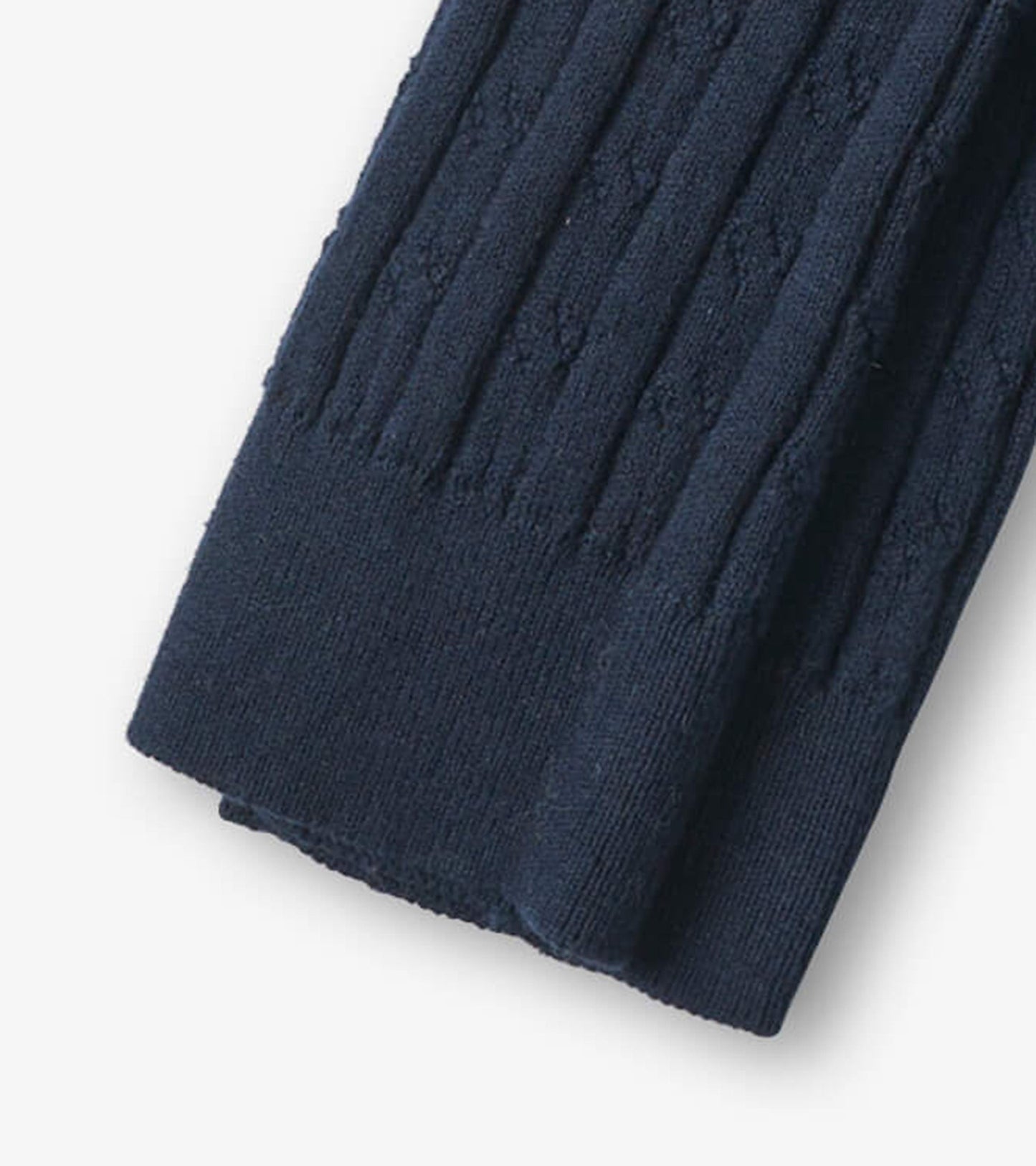 Navy cable knit tights with ribbed texture, suitable for girls, showcasing a soft and stretchy material.
