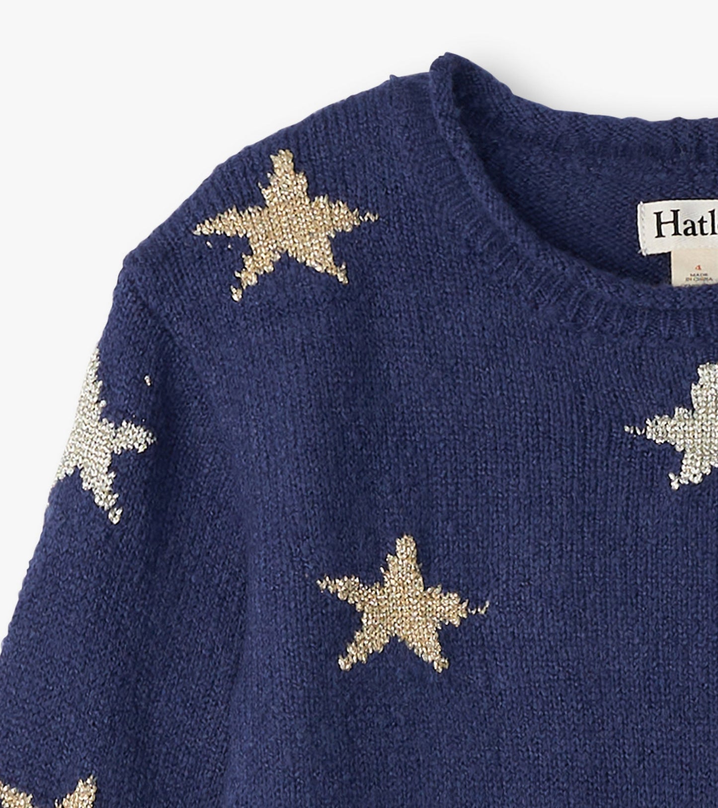 Navy blue sweater dress featuring gold star embellishments and a classic crew neckline.