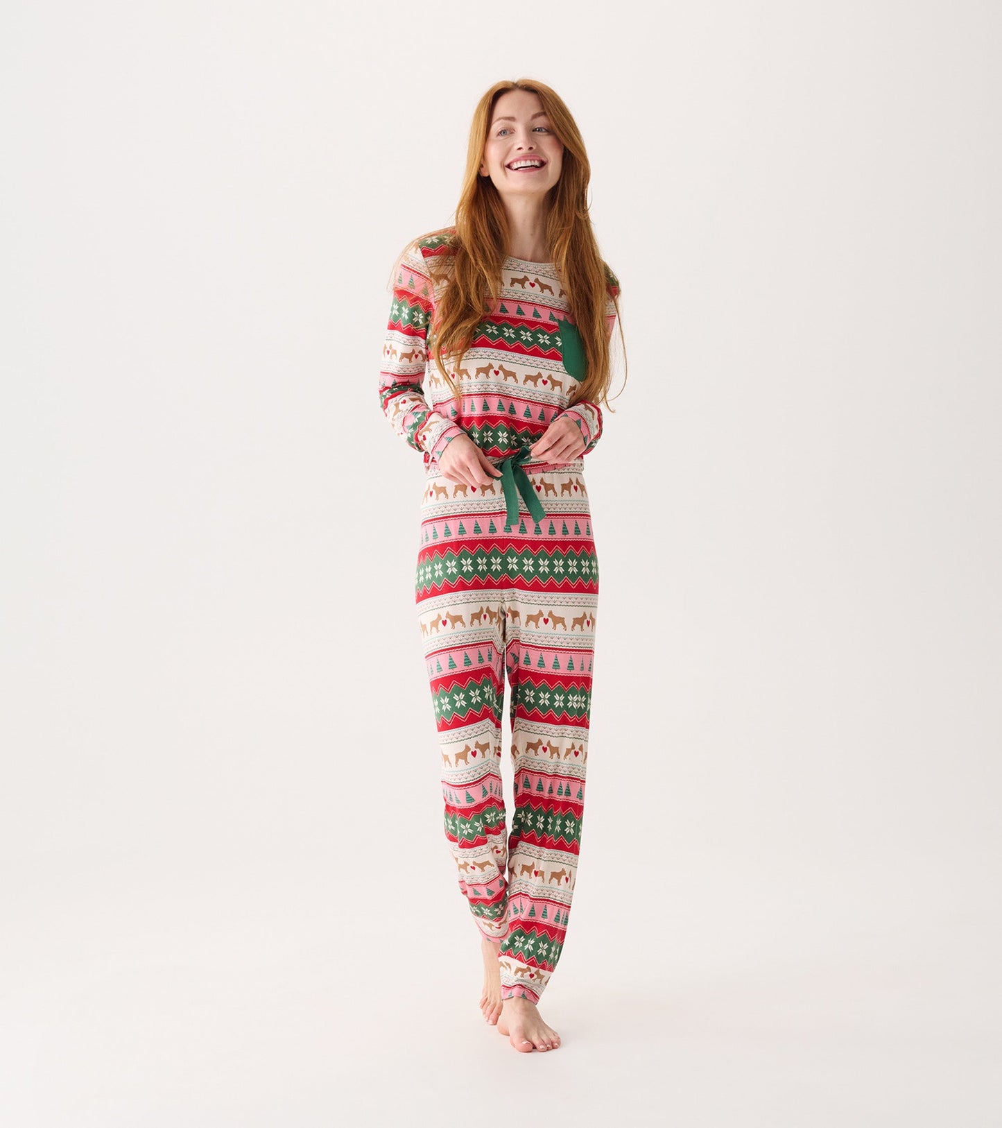 Long-sleeve bamboo pyjama set featuring a festive Fairisle pattern in pink, green, and cream with a drawstring waist.