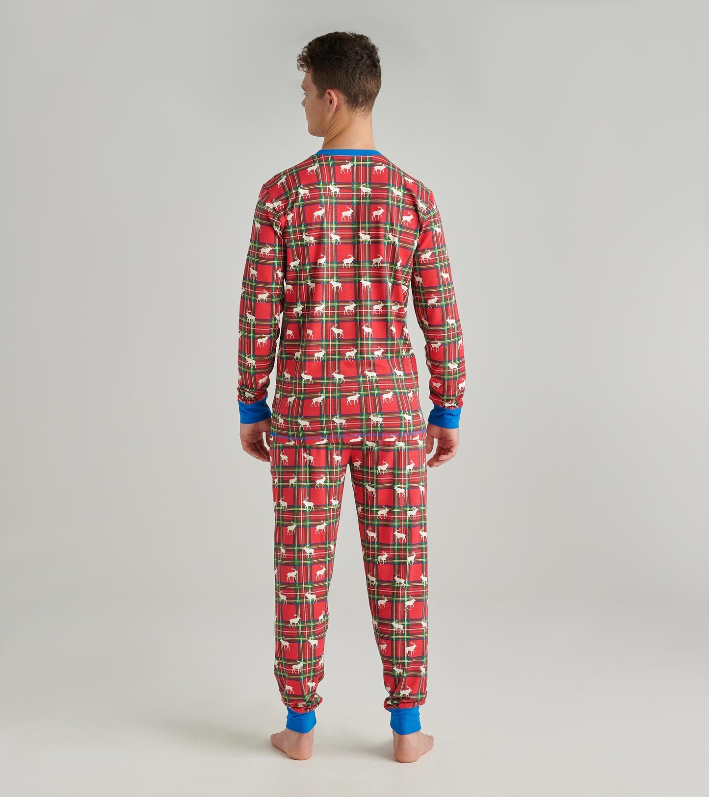 Men's red plaid pyjama set with moose pattern, featuring long sleeves and blue cuffs, shown from the back.