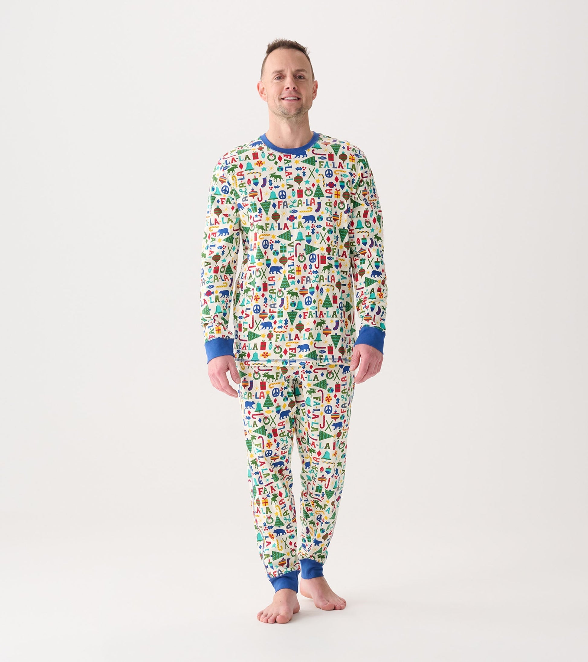 Men's blue and white pajama set featuring a festive print with various colorful patterns, designed for comfort and relaxatio…