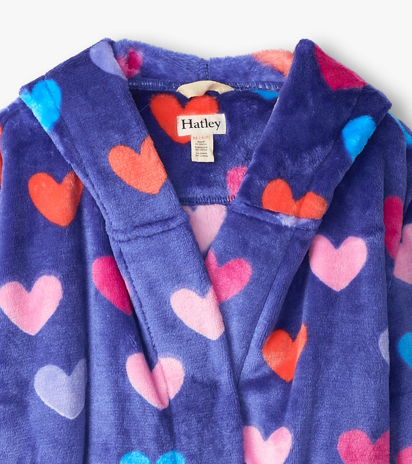Purple fleece robe featuring a colorful heart pattern, designed for baby girls, with a cozy hood and front tie closure.