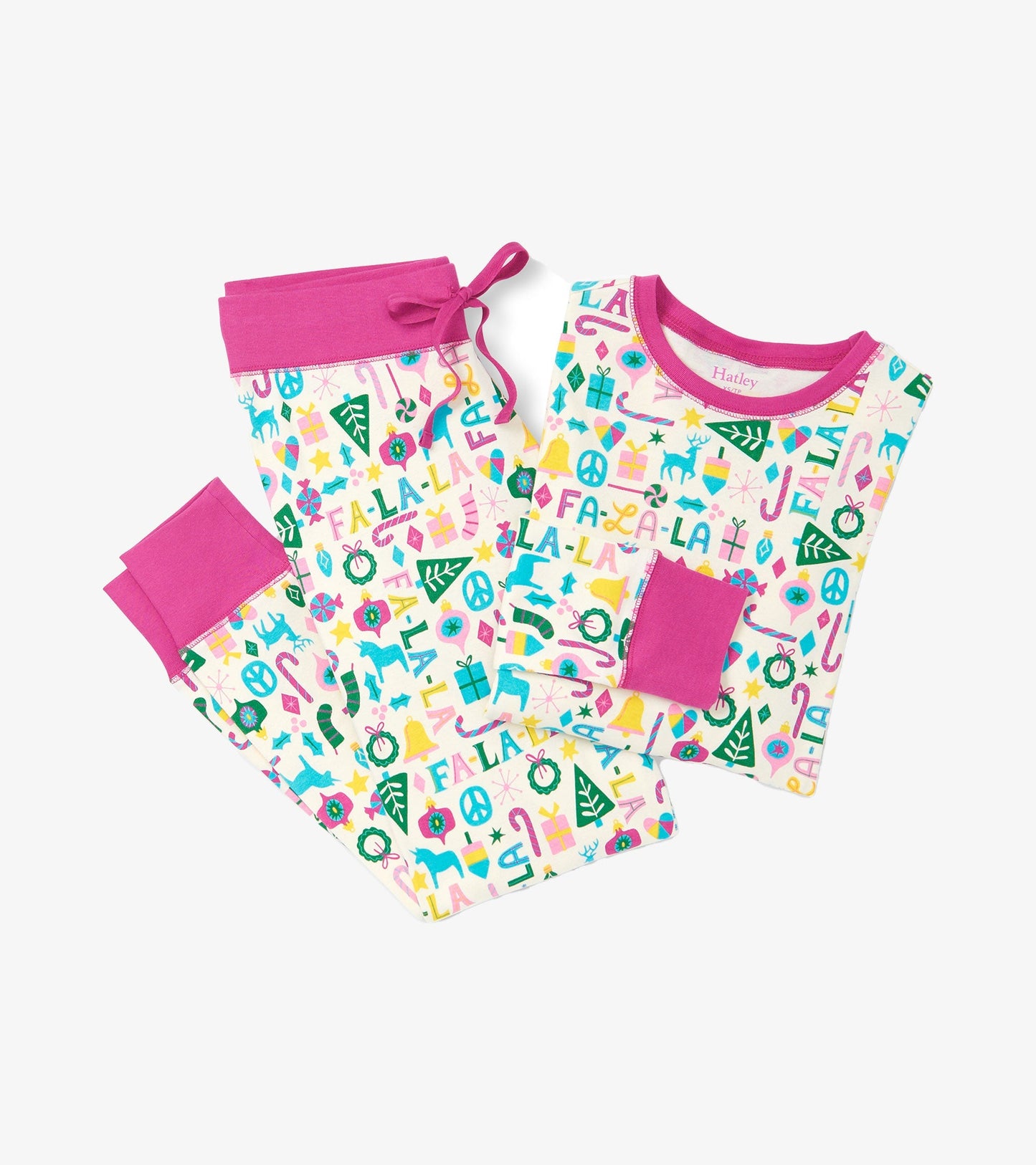 Women's pink pyjama set featuring a festive print with colorful patterns, including gifts and holiday motifs.