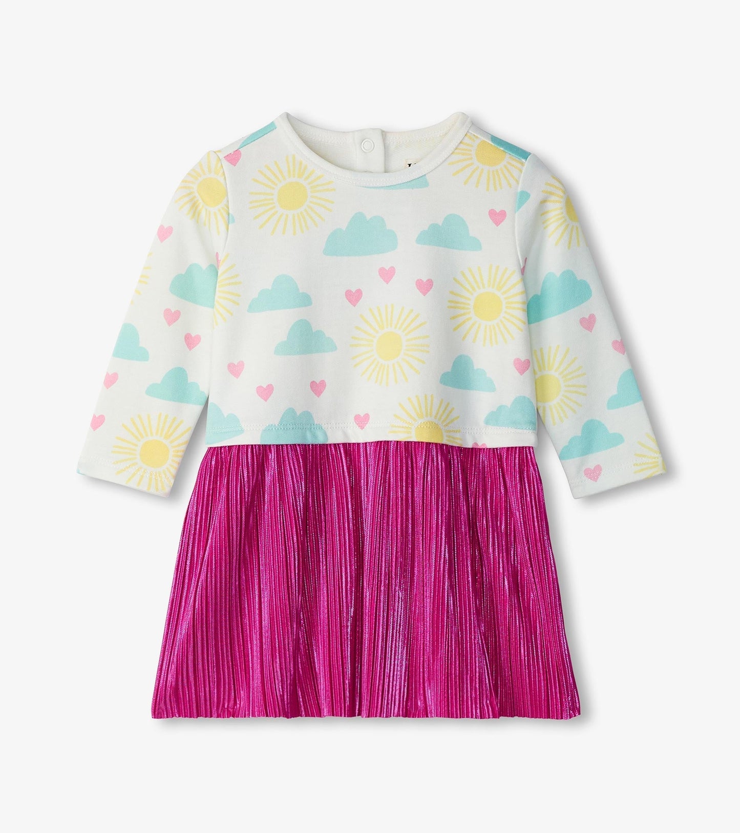 Layered knit dress featuring a white top with sun and cloud prints and a pleated pink skirt. Long sleeves and round neckline.