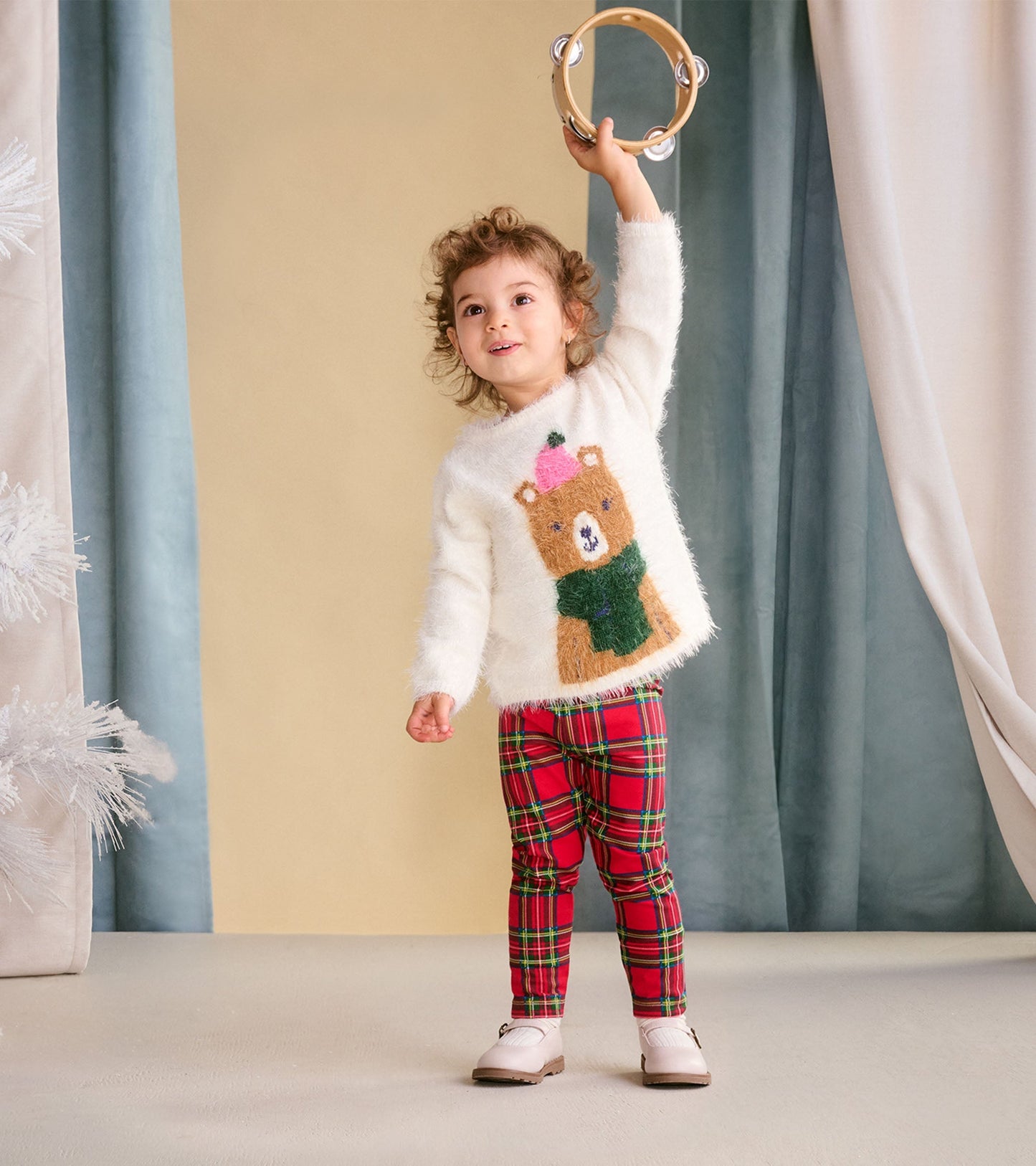 Red plaid leggings for babies and toddlers, featuring a snug fit and soft fabric, perfect for casual wear.