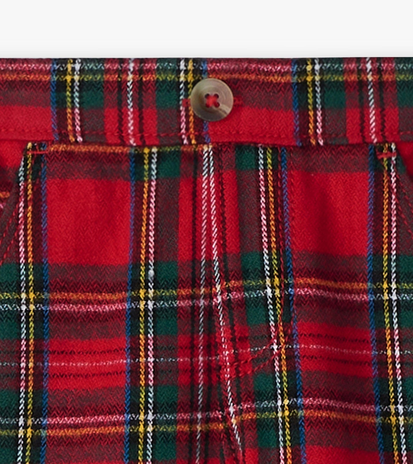 Red plaid straight leg pants with a button closure, featuring a mix of green, yellow, and blue lines.