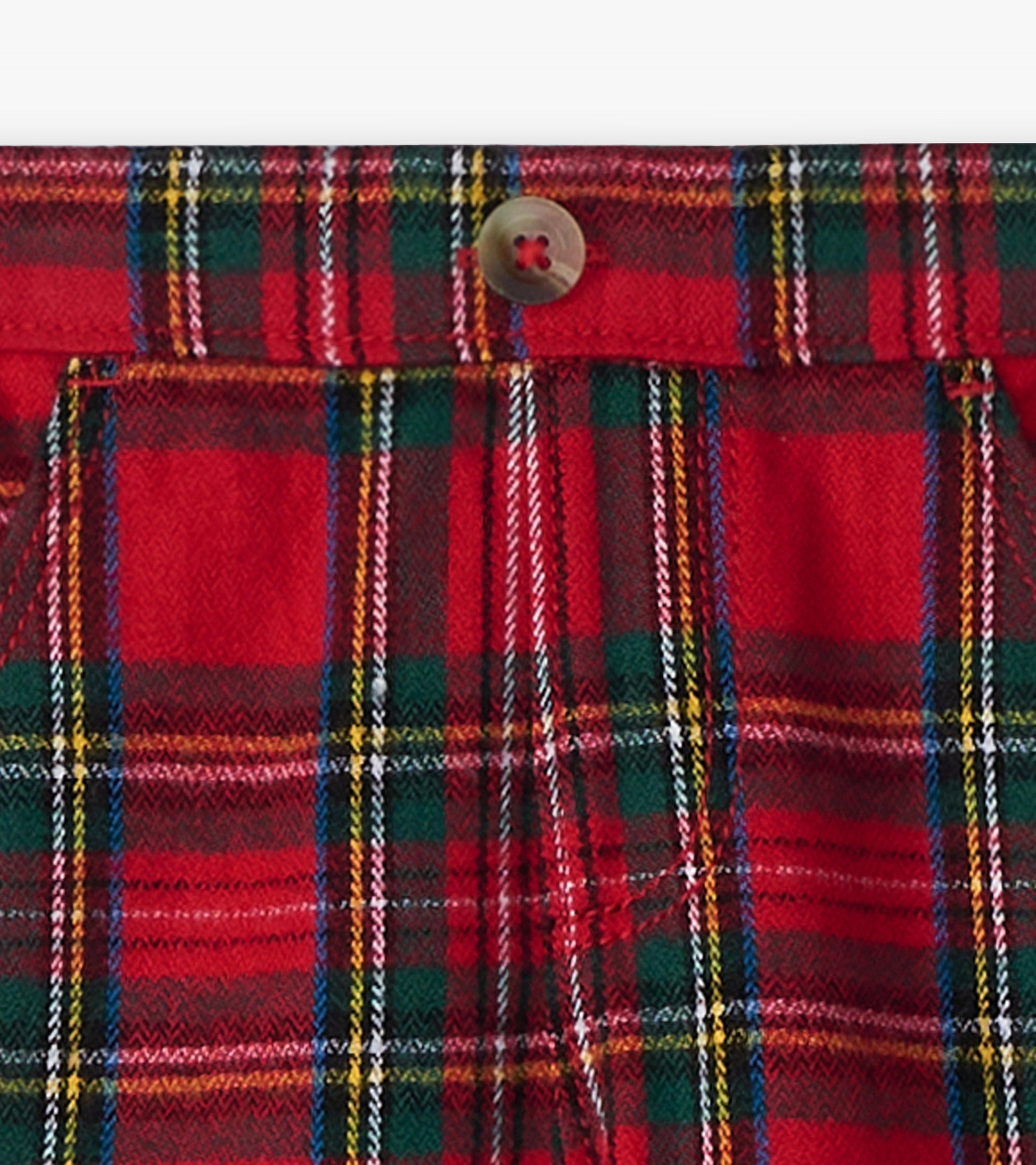 Red plaid straight leg pants with a button closure, featuring a mix of green, yellow, and blue lines.
