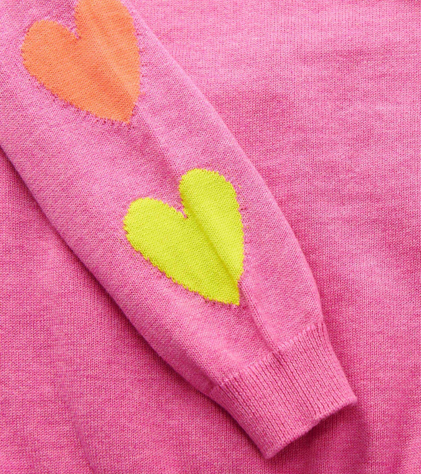 Pink sweater featuring colorful heart appliqués in orange and green on the sleeves, suitable for baby and toddler girls.