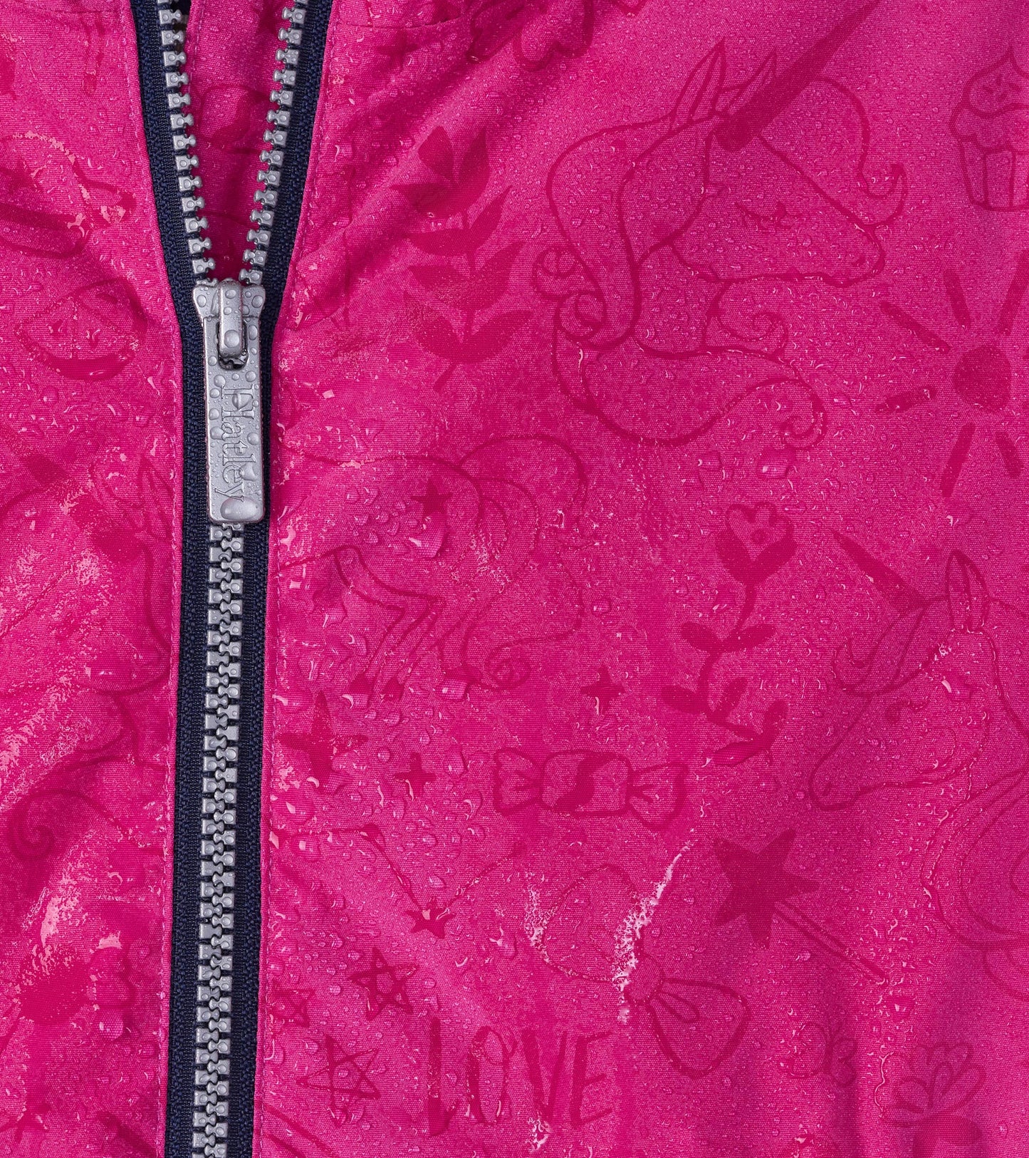 Lightweight pink raincoat with unicorn doodles and a zip-up front, featuring a water-resistant finish.