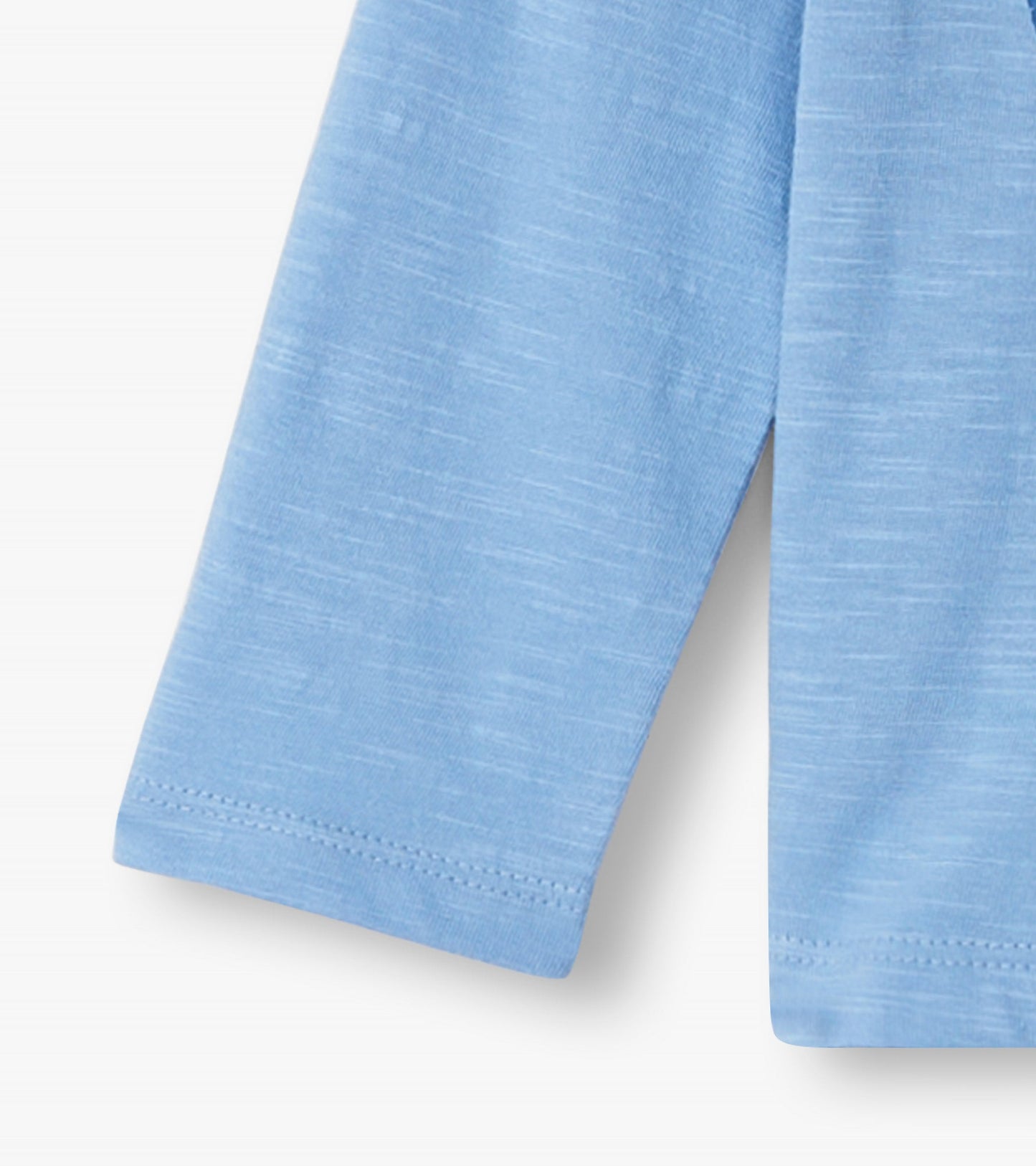 Light blue long sleeve t-shirt for baby and toddler girls, featuring a soft fabric and a groovy heart design.