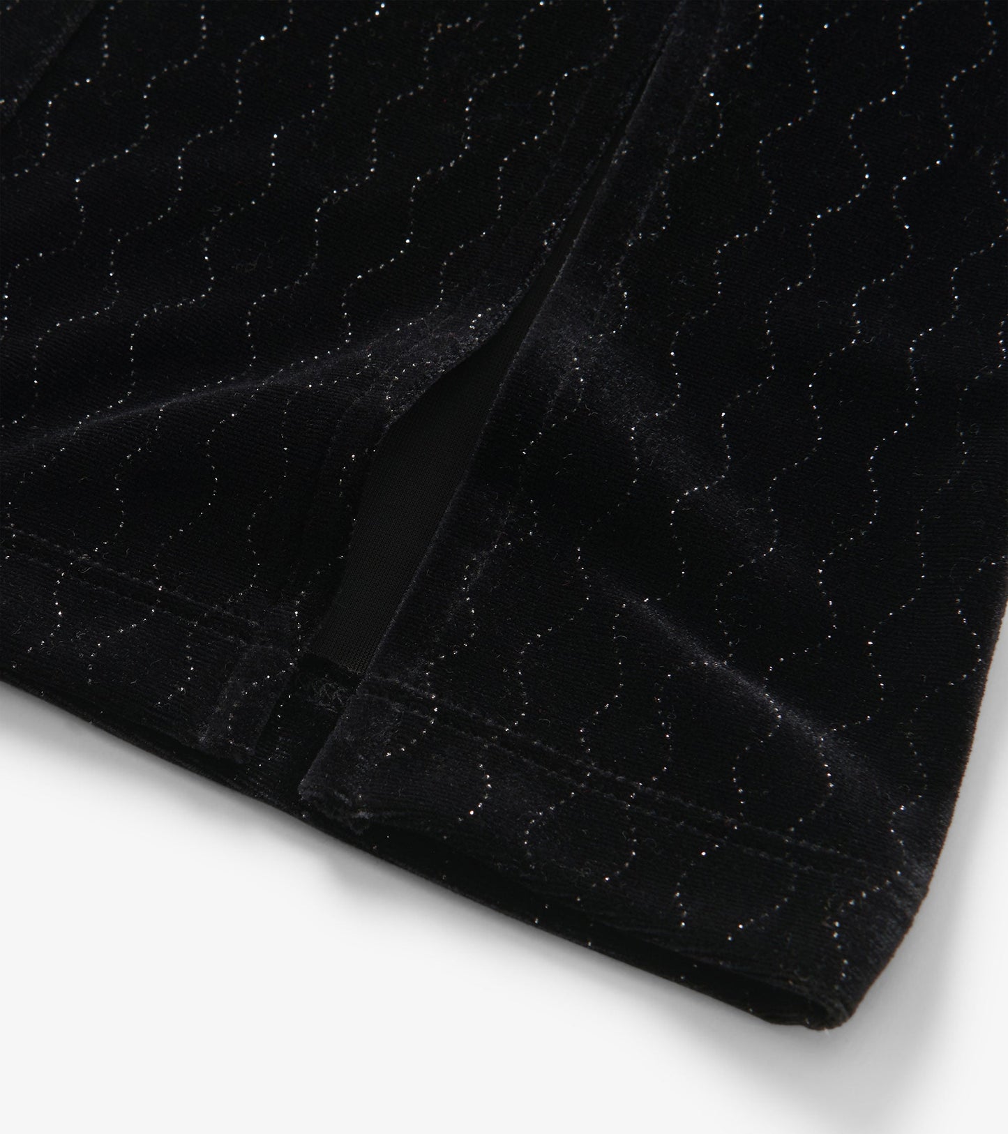 Black velour flared pants with a wavy sparkle pattern, suitable for girls, featuring a soft texture and comfortable fit.