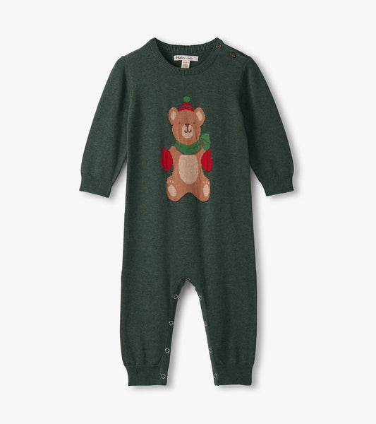 Green knitted sweater romper featuring a teddy bear design, long sleeves, and snap closures at the bottom.