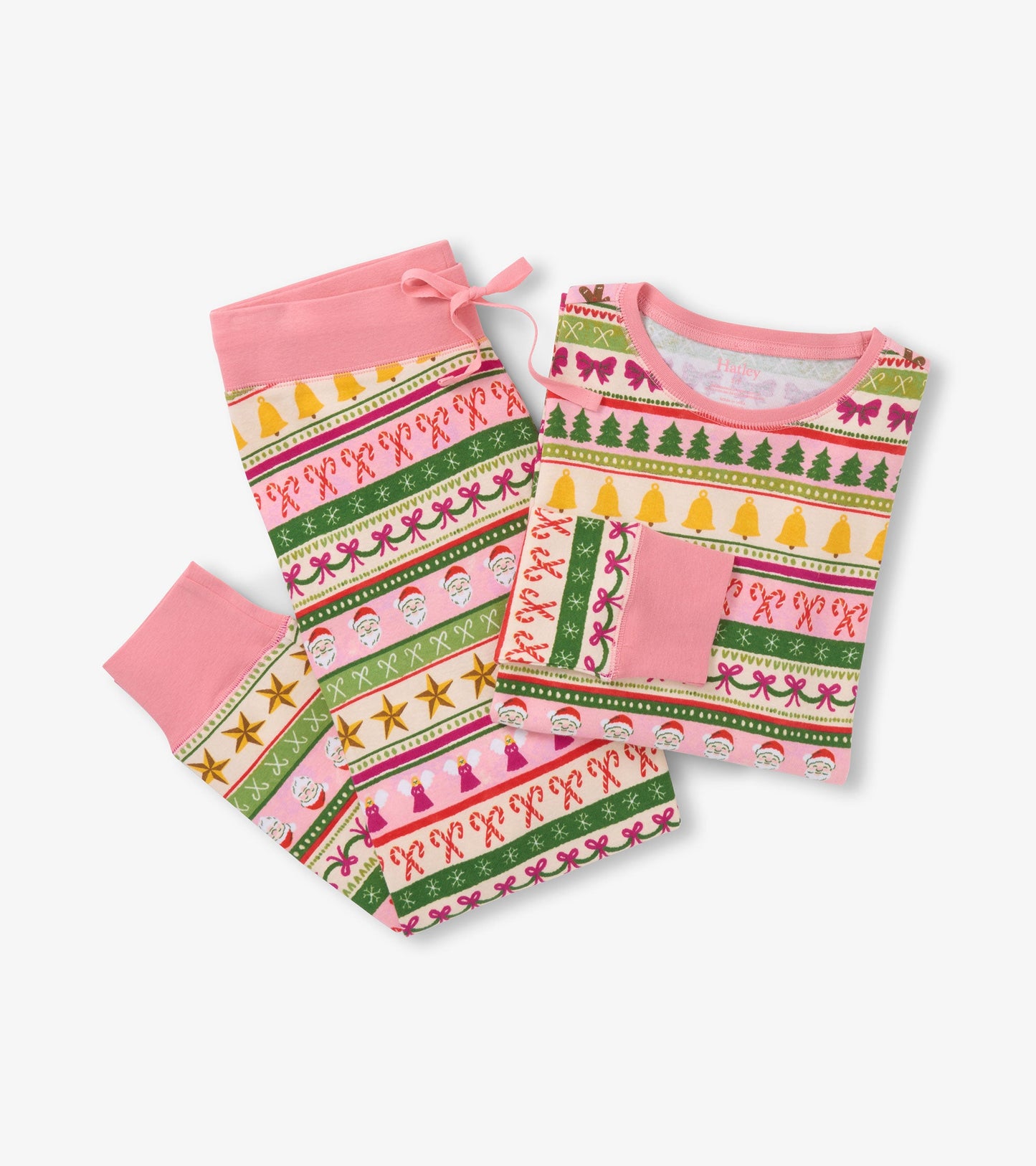 Women's pink cotton pyjama set featuring a fun Fair Isle pattern with festive motifs, includes a top and matching pants.