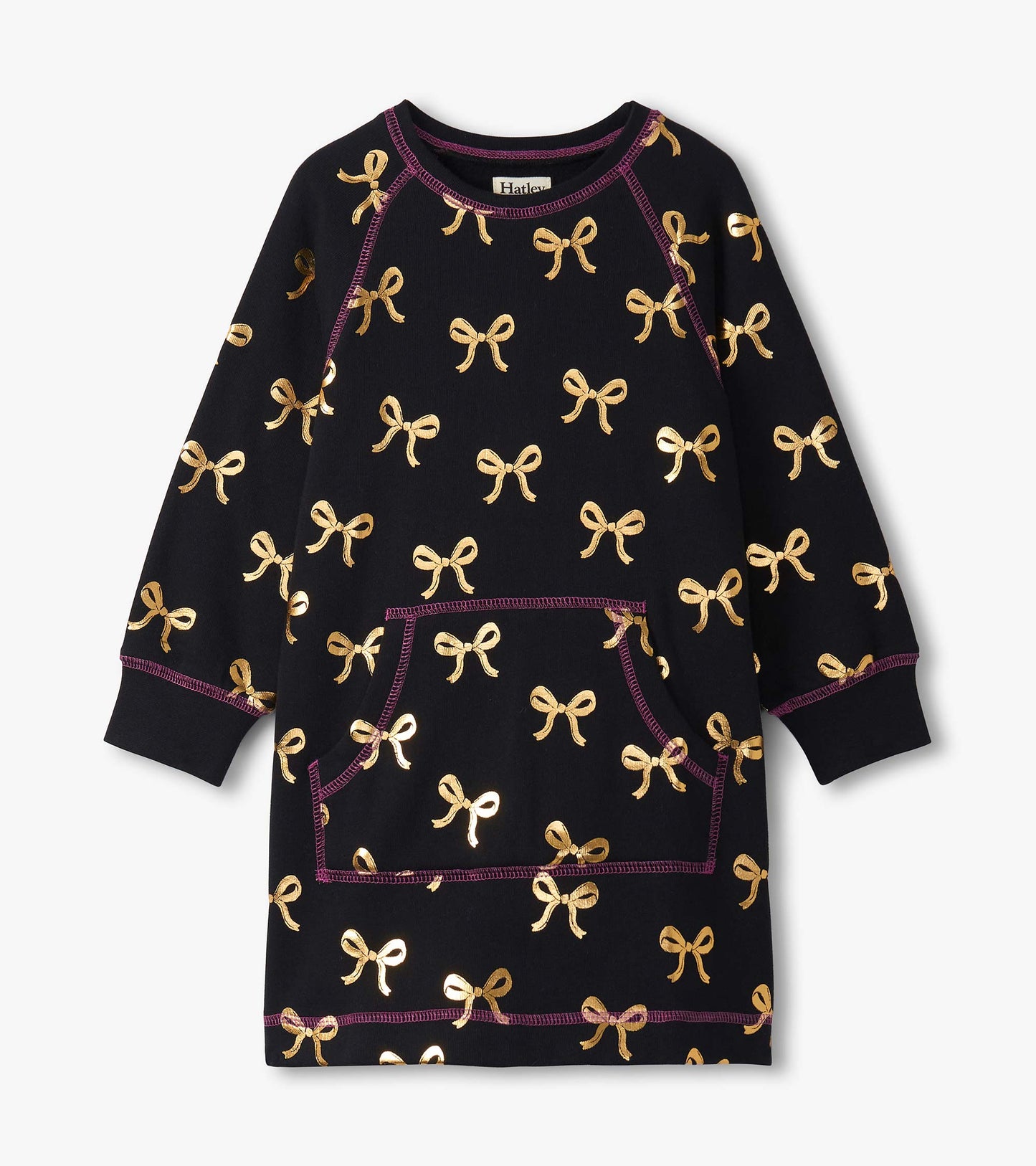 Black sweater dress featuring gold bow patterns and a front pocket, with purple stitching details.