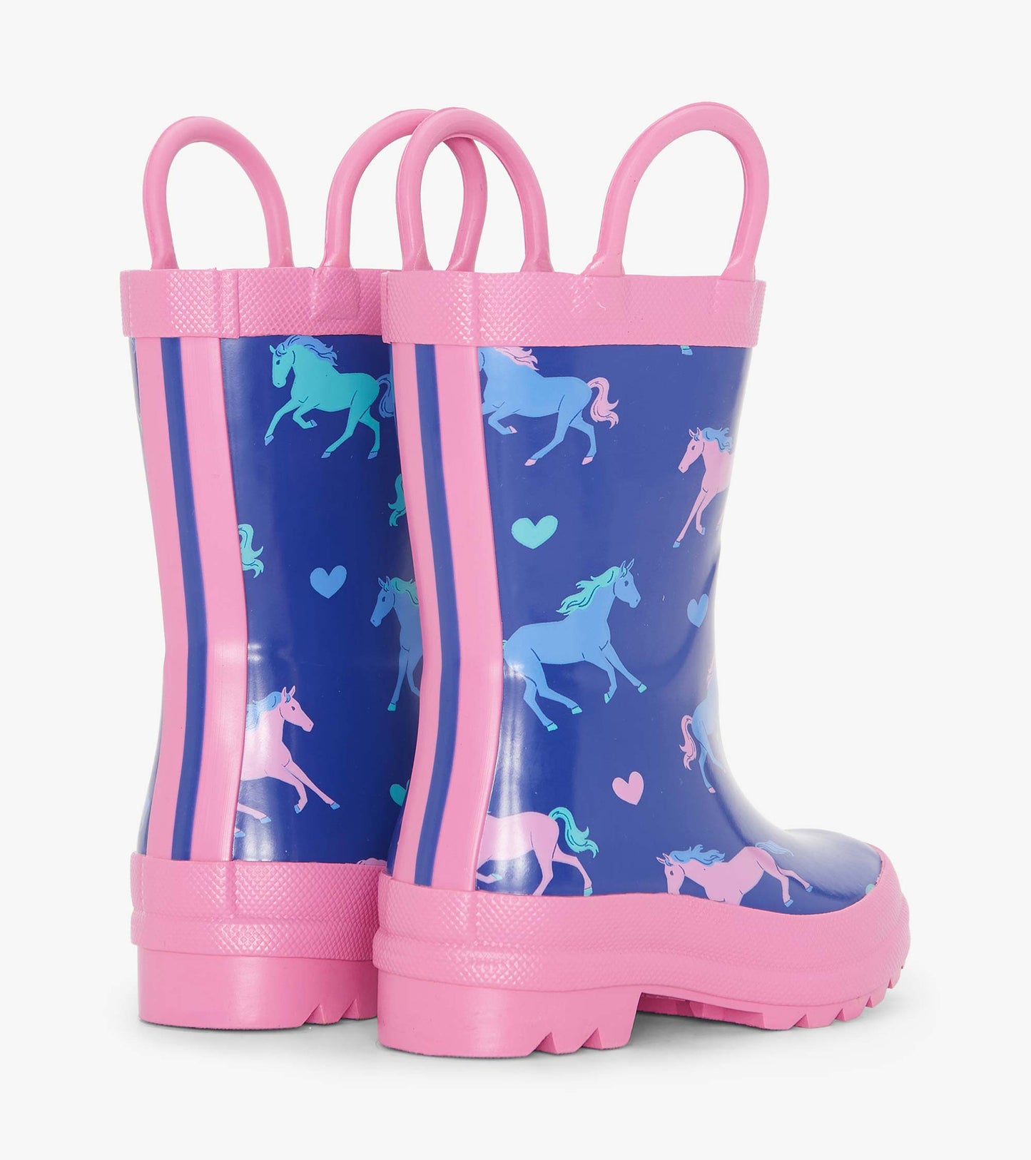 Blue rubber wellies with pink accents, featuring a unicorn and heart pattern, designed for toddlers.