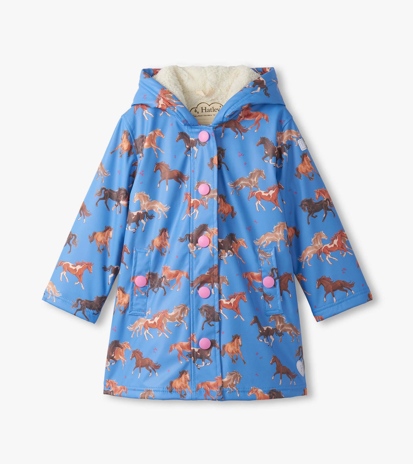 Blue raincoat with a horse print, sherpa lining, and pink buttons, featuring a hood and front pockets.