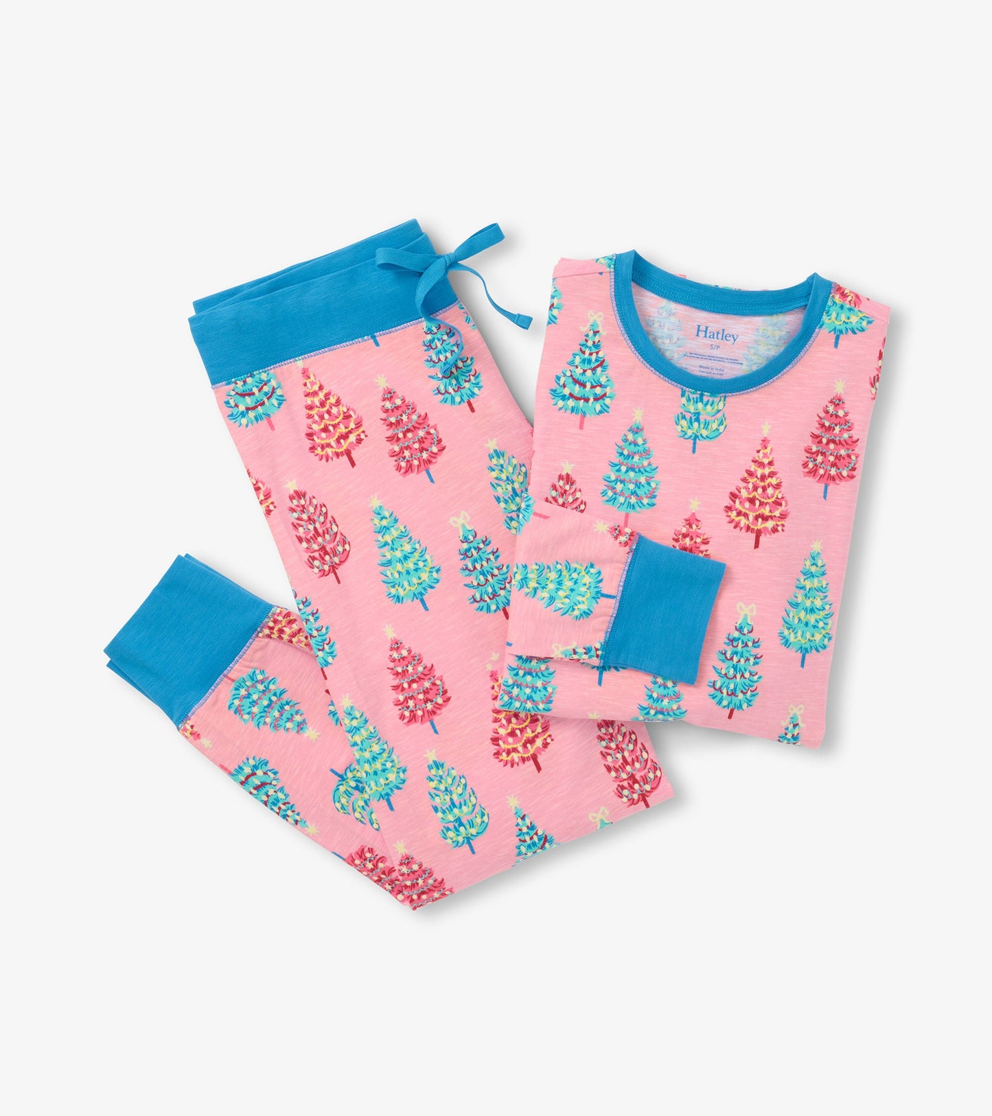 Pink cotton pyjama set featuring colorful bottle brush tree patterns, with blue accents on the cuffs and waistband.