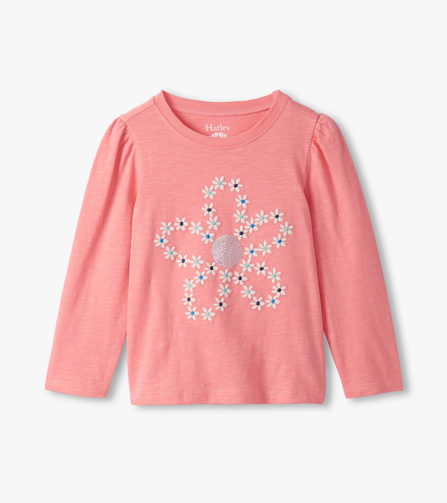 Pink long-sleeve tee featuring embroidered flower design with puff sleeves. Suitable for girls.