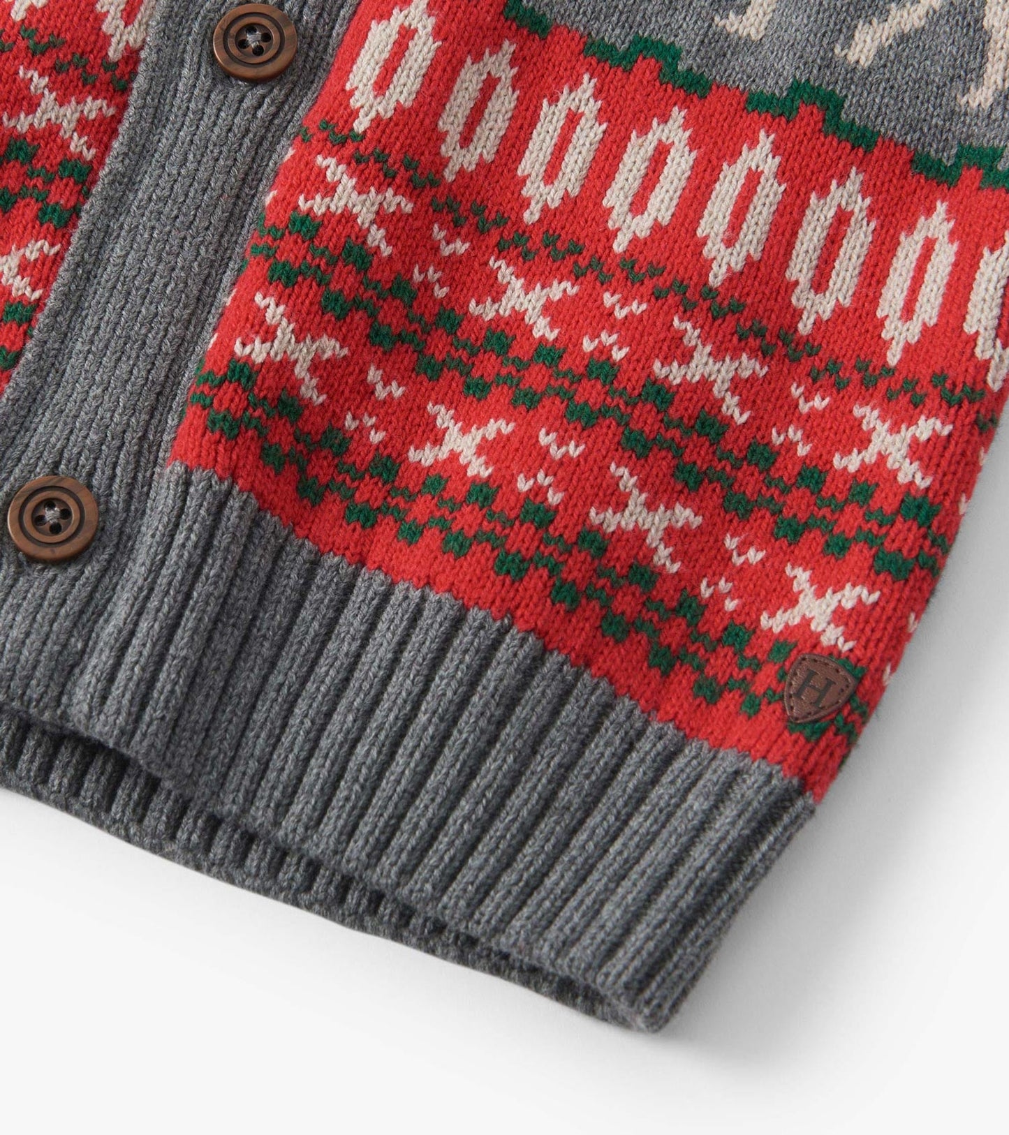 Red and gray knitted cardigan featuring an elk pattern, ribbed cuffs, and wooden buttons.