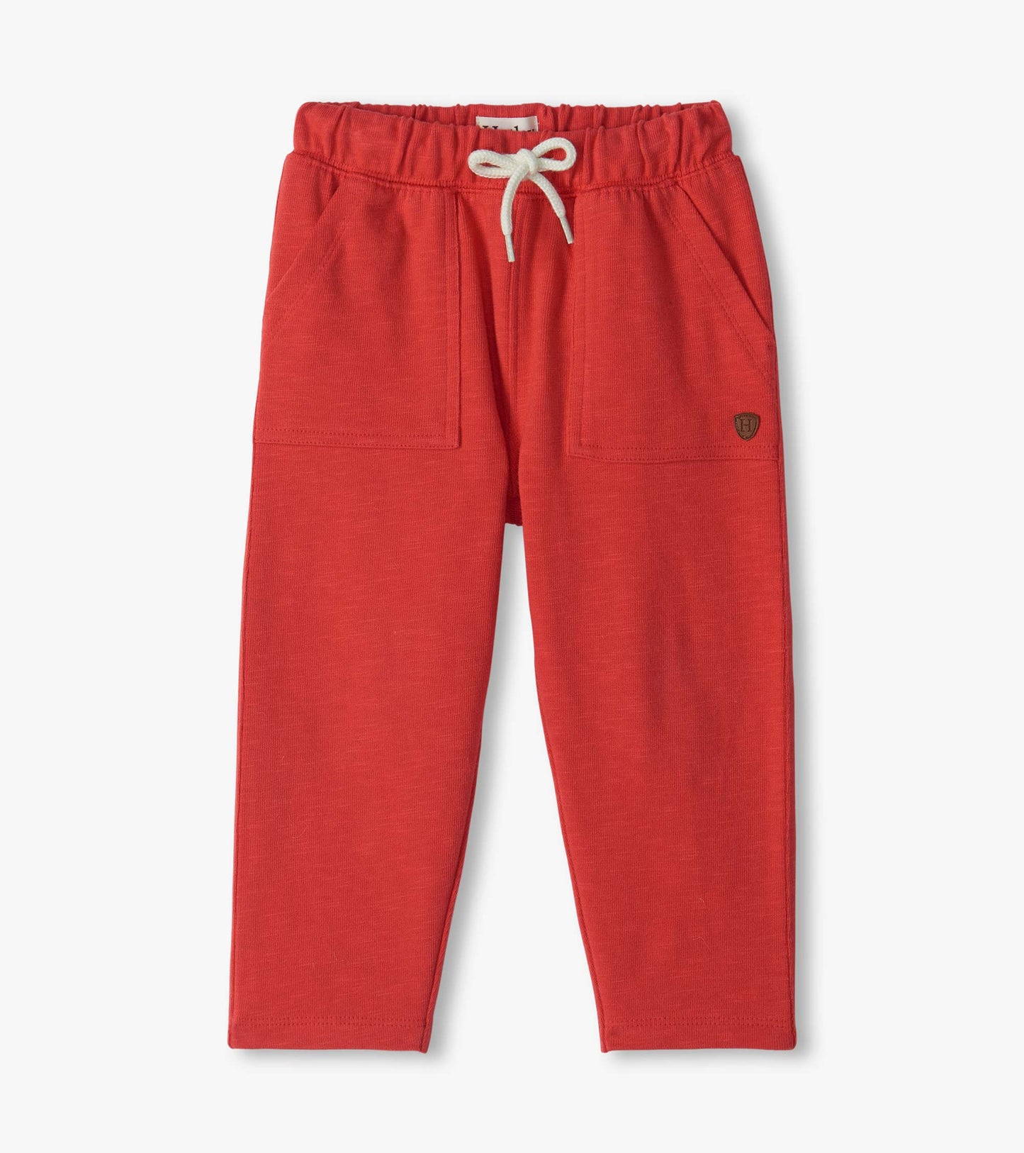 Infant chrysanthemum pull-on pants with elastic waist, white drawstring, front pockets, and tapered legs