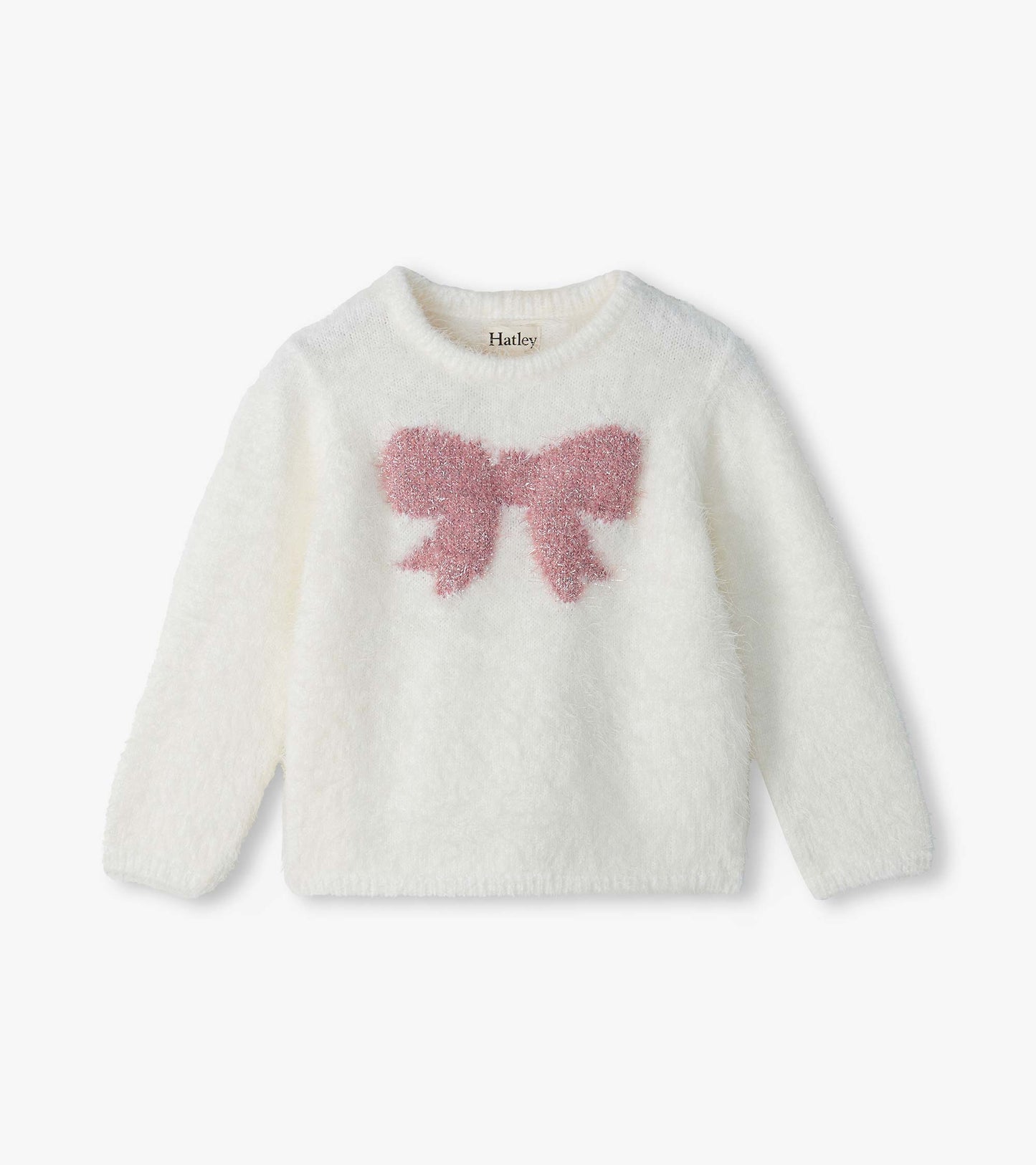 Infant fuzzy white sweater with long sleeves and a pink bow graphic on the front