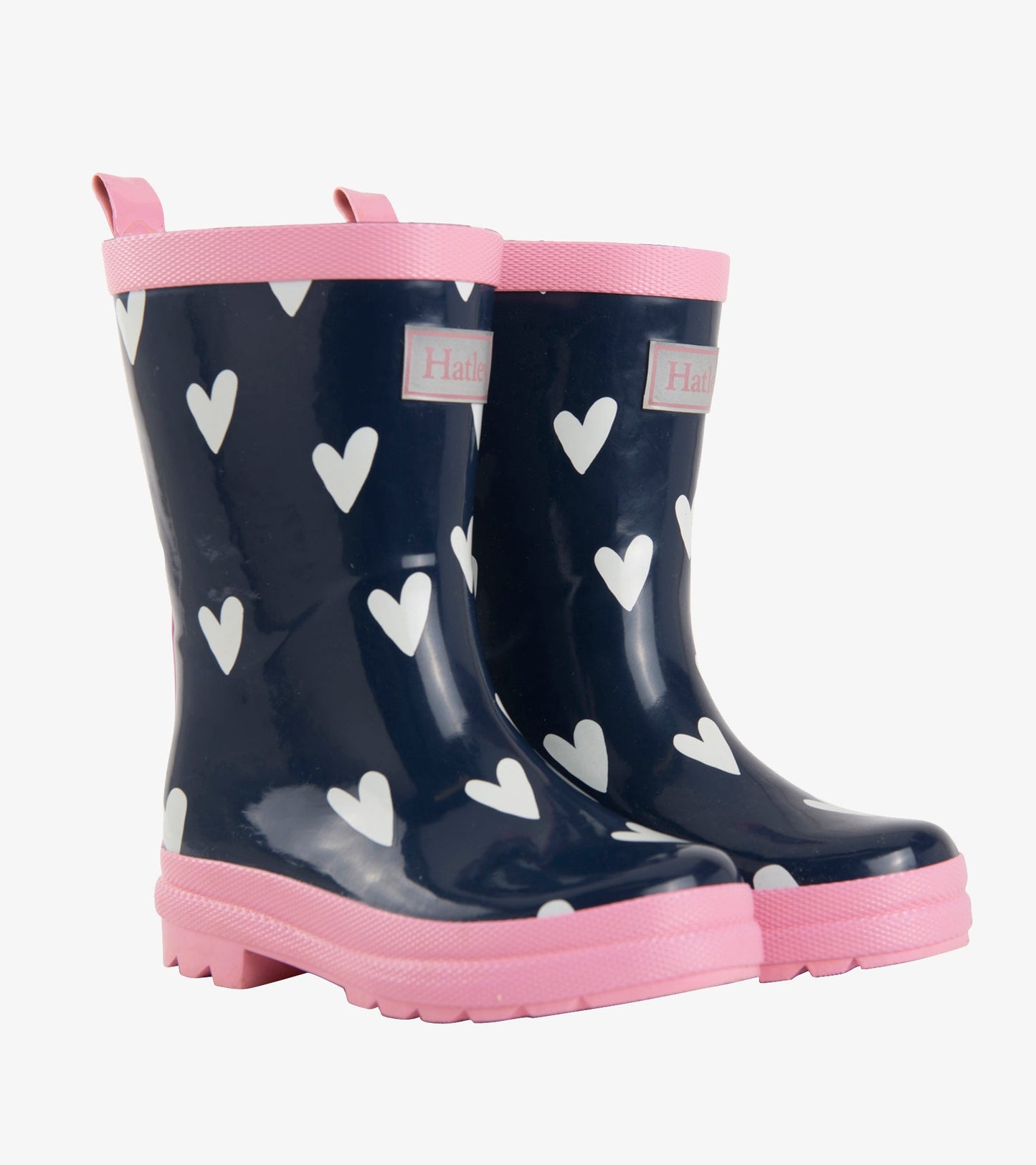 Navy rubber boots with white heart patterns and pink accents, designed for kids.