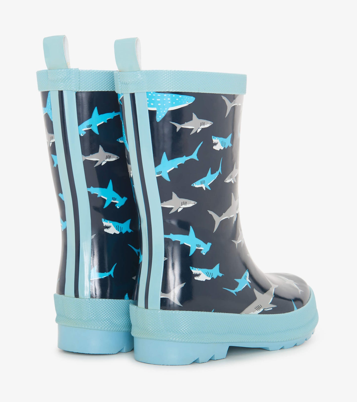 Navy blue wellies featuring a shark pattern and light blue accents, designed for kids with a textured sole for grip.