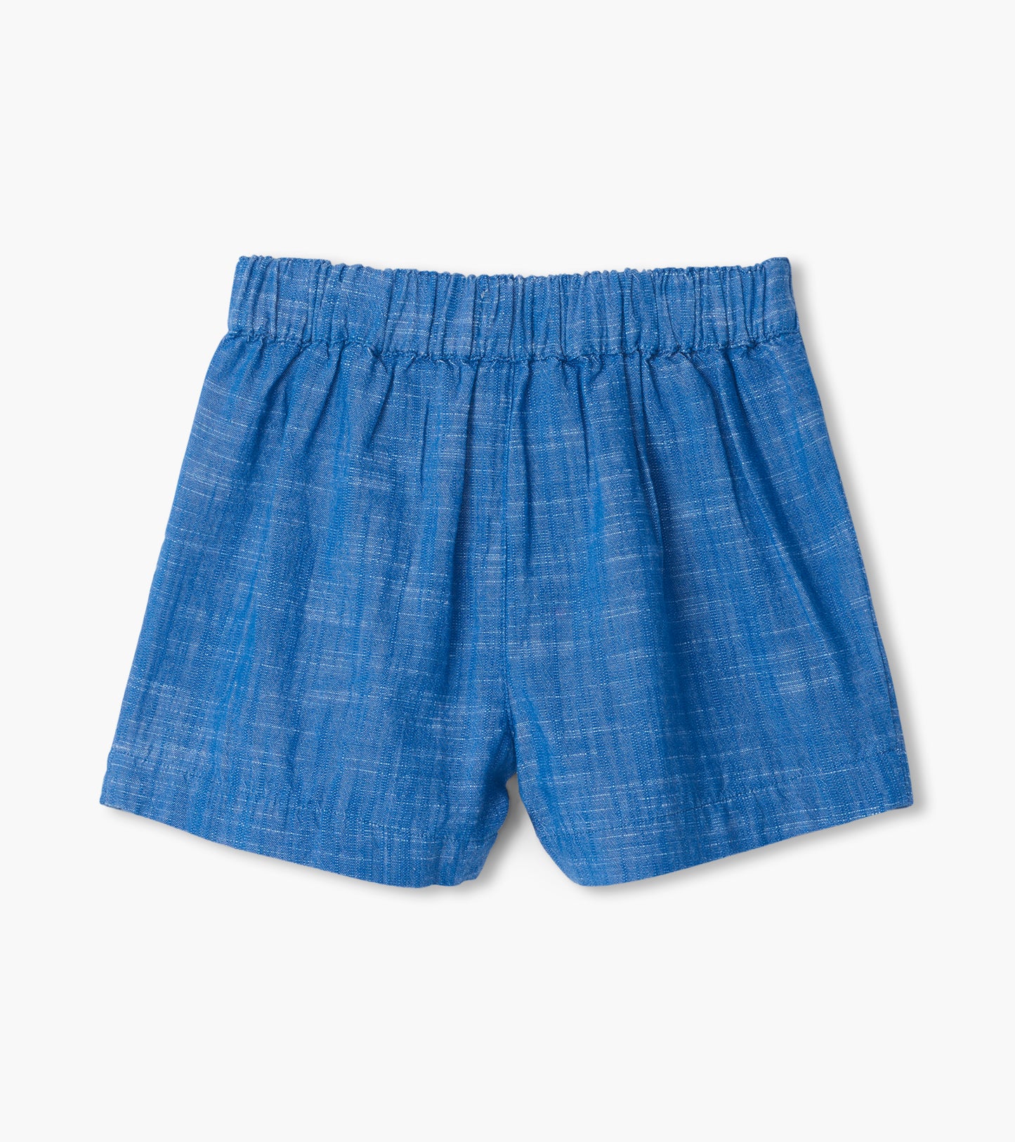 Blue chambray girls shorts with elastic paper bag waist, front view