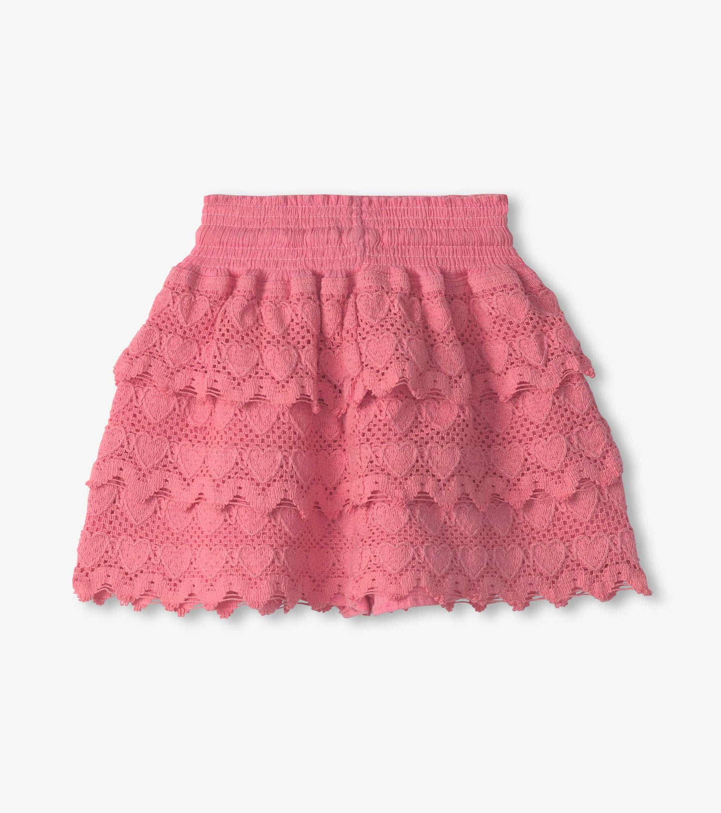 Pink skort with layered ruffles and heart-shaped cutouts, featuring an elastic waistband for comfort.