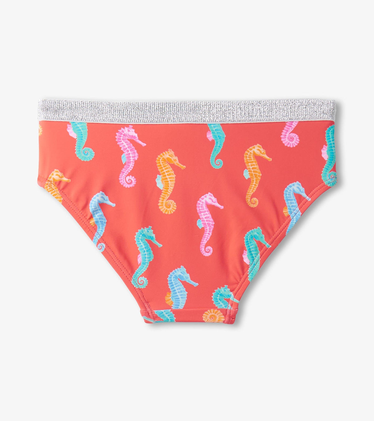 Coral tankini bottom featuring colorful seahorse patterns and a silver waistband. Suitable for girls.