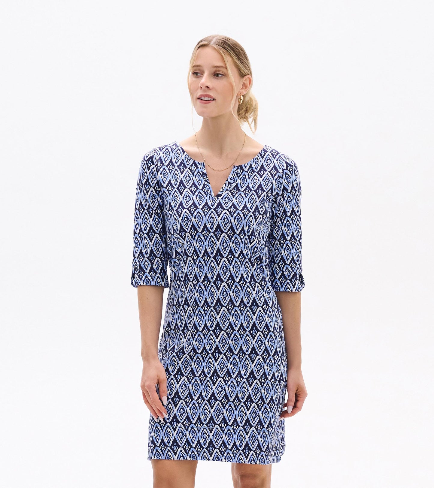 Navy dress with a painted diamond pattern, featuring a V-neck and three-quarter sleeves, suitable for casual wear.