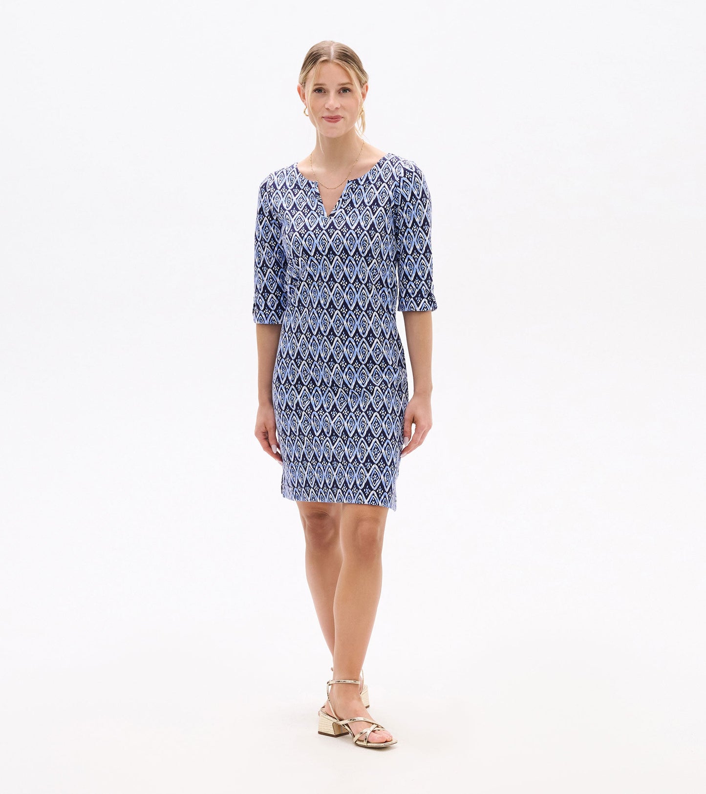 Short-sleeve dress featuring a blue and white diamond pattern with a V-neckline, suitable for casual or semi-formal wear.