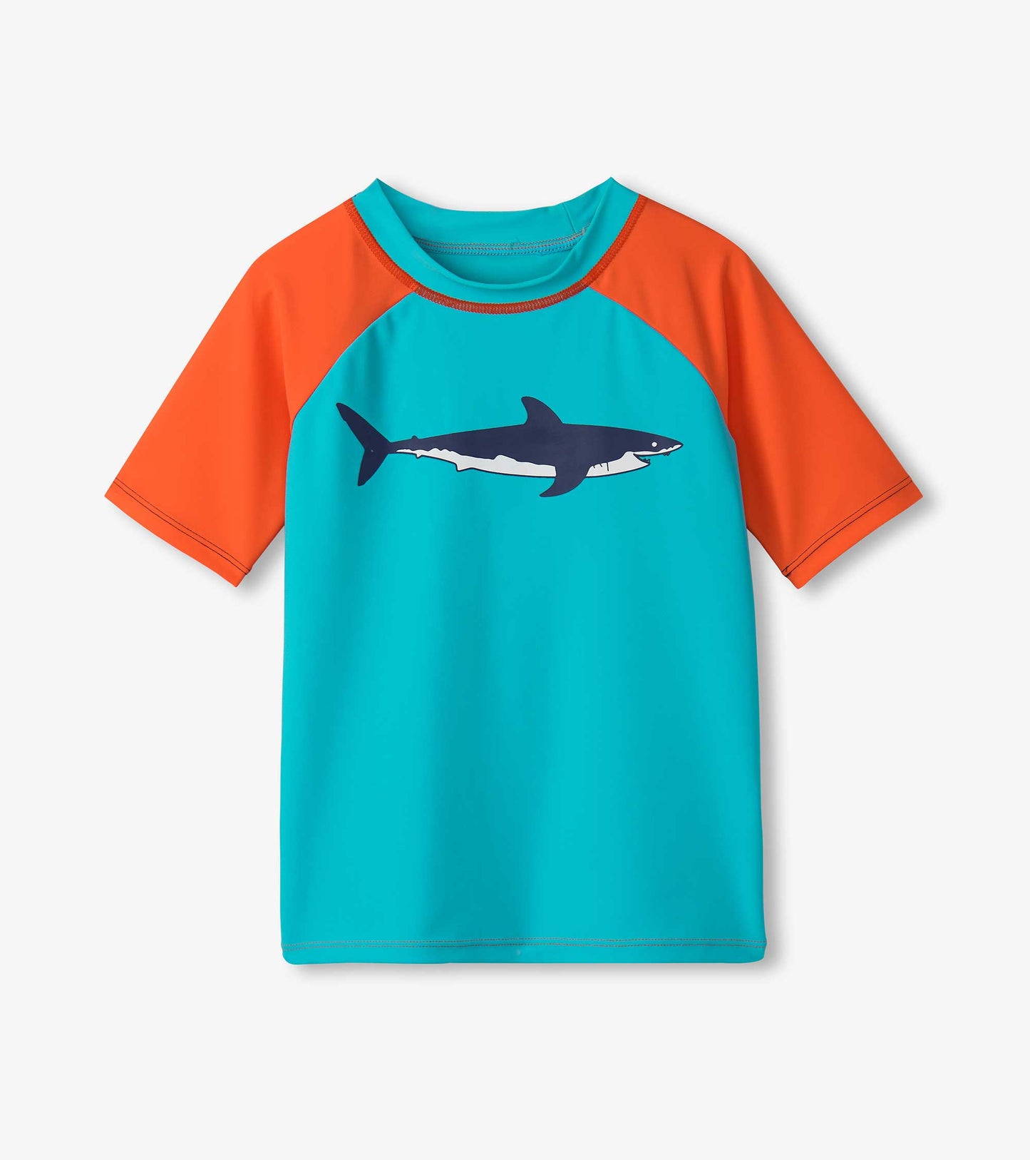 Short sleeve rashguard in turquoise and orange with a shark graphic on the front, ideal for boys' swimwear.