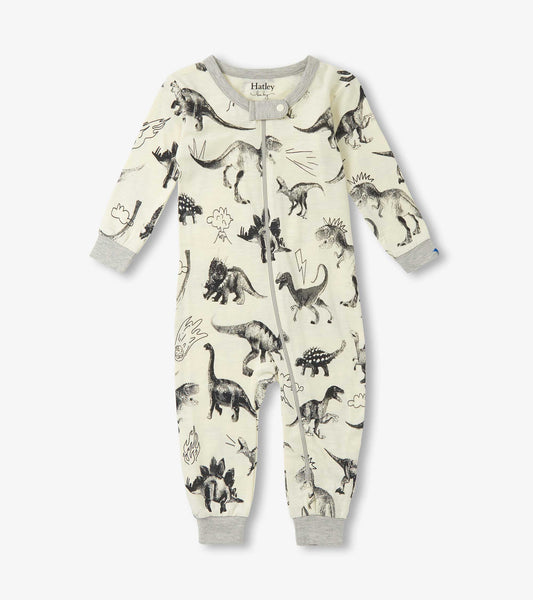 Cream sleeper featuring a dinosaur print, with long sleeves and a front zipper closure.
