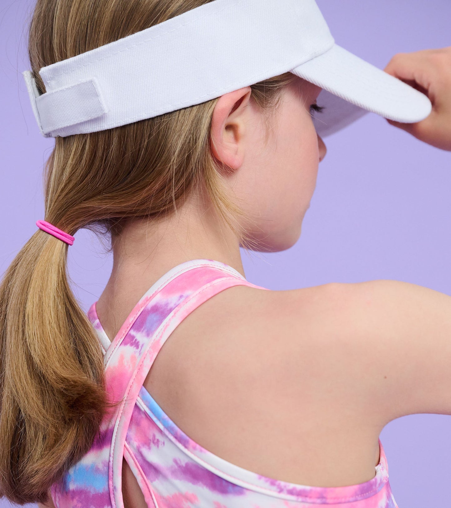 Girls' active A-line dress in candy ombre pattern, featuring a sleeveless design and racerback style.