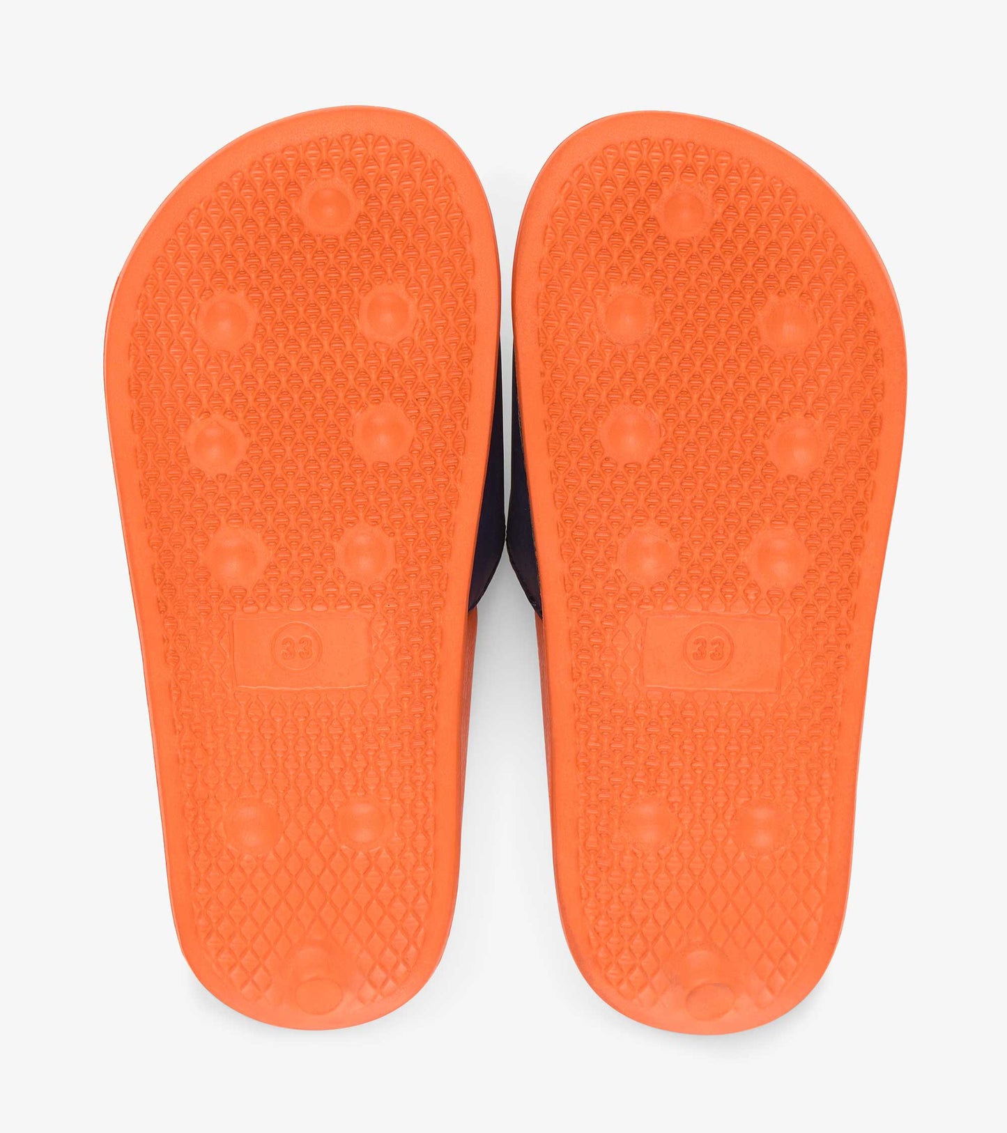 Orange rubber soles with textured grip, designed for boys' shark-themed slides.