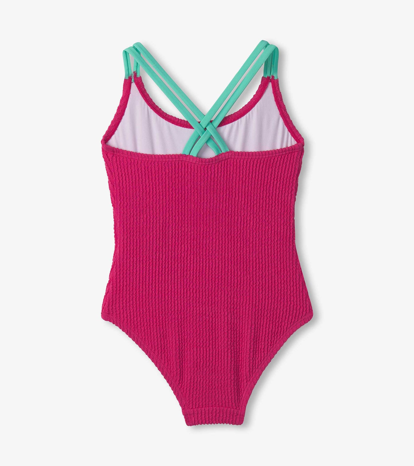 Fuchsia purple cross strap swimsuit with textured fabric and contrasting straps, suitable for girls. Back view.