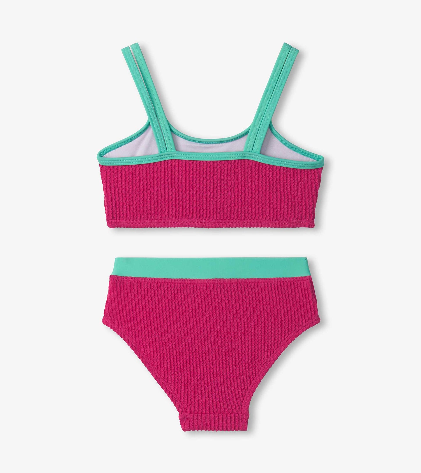 Fuchsia purple bikini set with textured fabric, featuring a crop top and matching bottoms with turquoise accents.