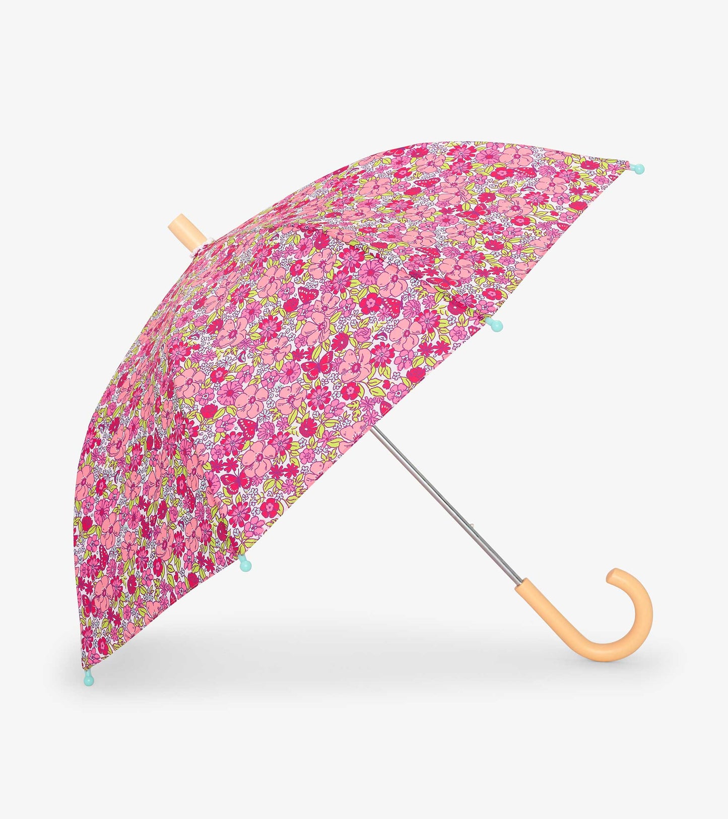 Pink umbrella featuring a vibrant floral pattern, with a curved handle and light blue tips.