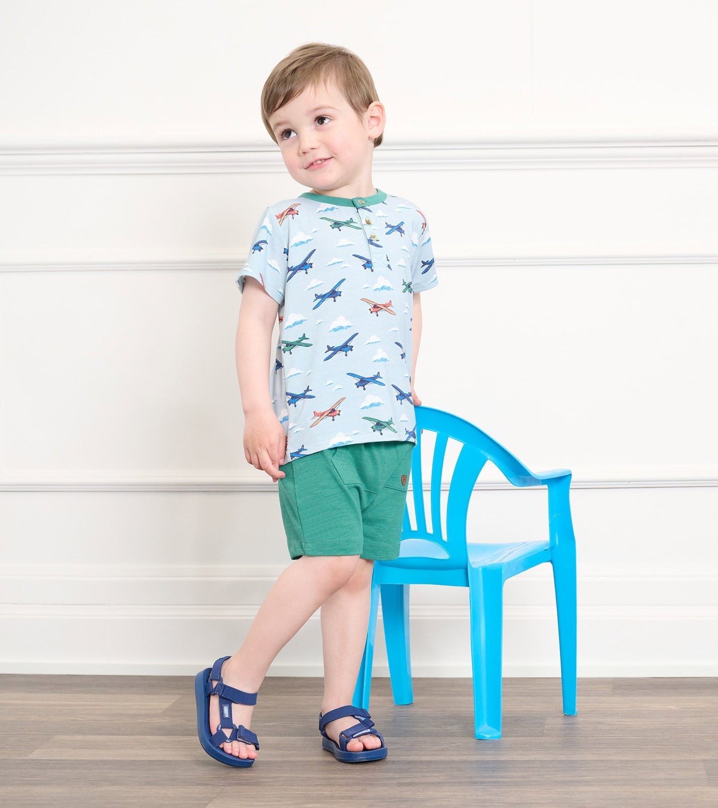 Emerald green kangaroo shorts for baby and toddler boys, featuring a comfortable fit and casual style.