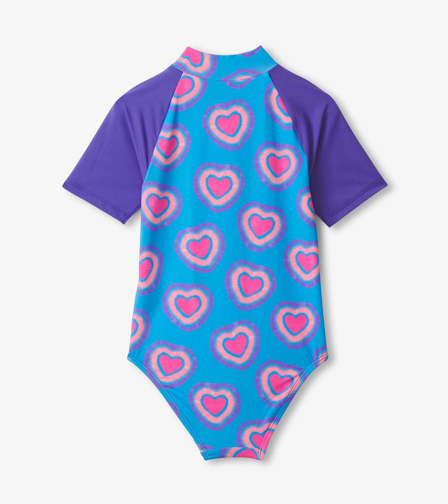 Blue one-piece rashguard with purple sleeves, featuring a pattern of pink hearts on the back.