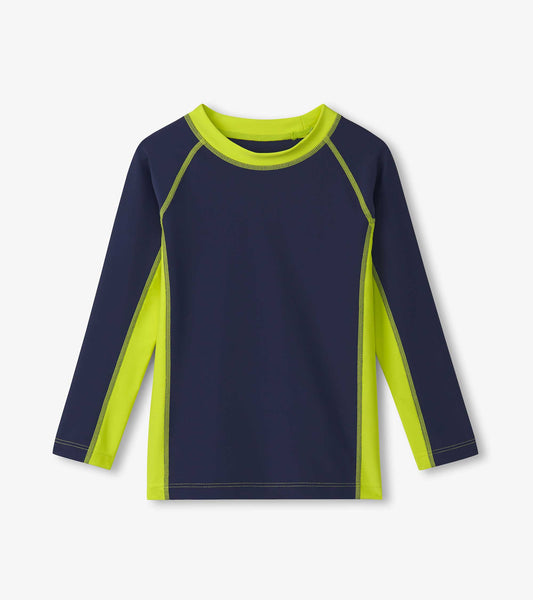 Navy long sleeve rashguard with bright green side panels and stitching, suitable for boys' swimwear.
