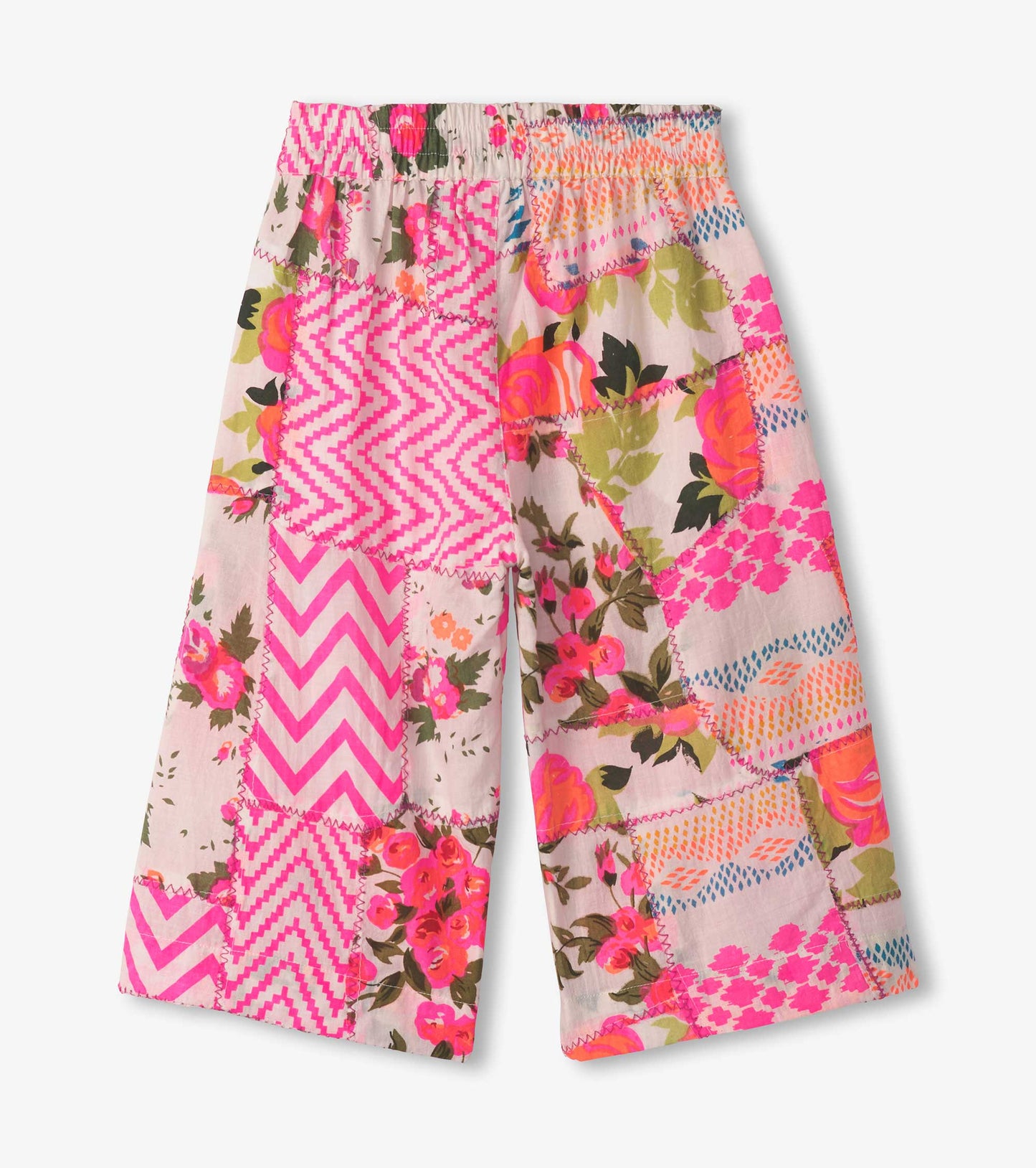 Cropped culottes featuring a colorful floral and geometric patchwork design with an elastic waistband.