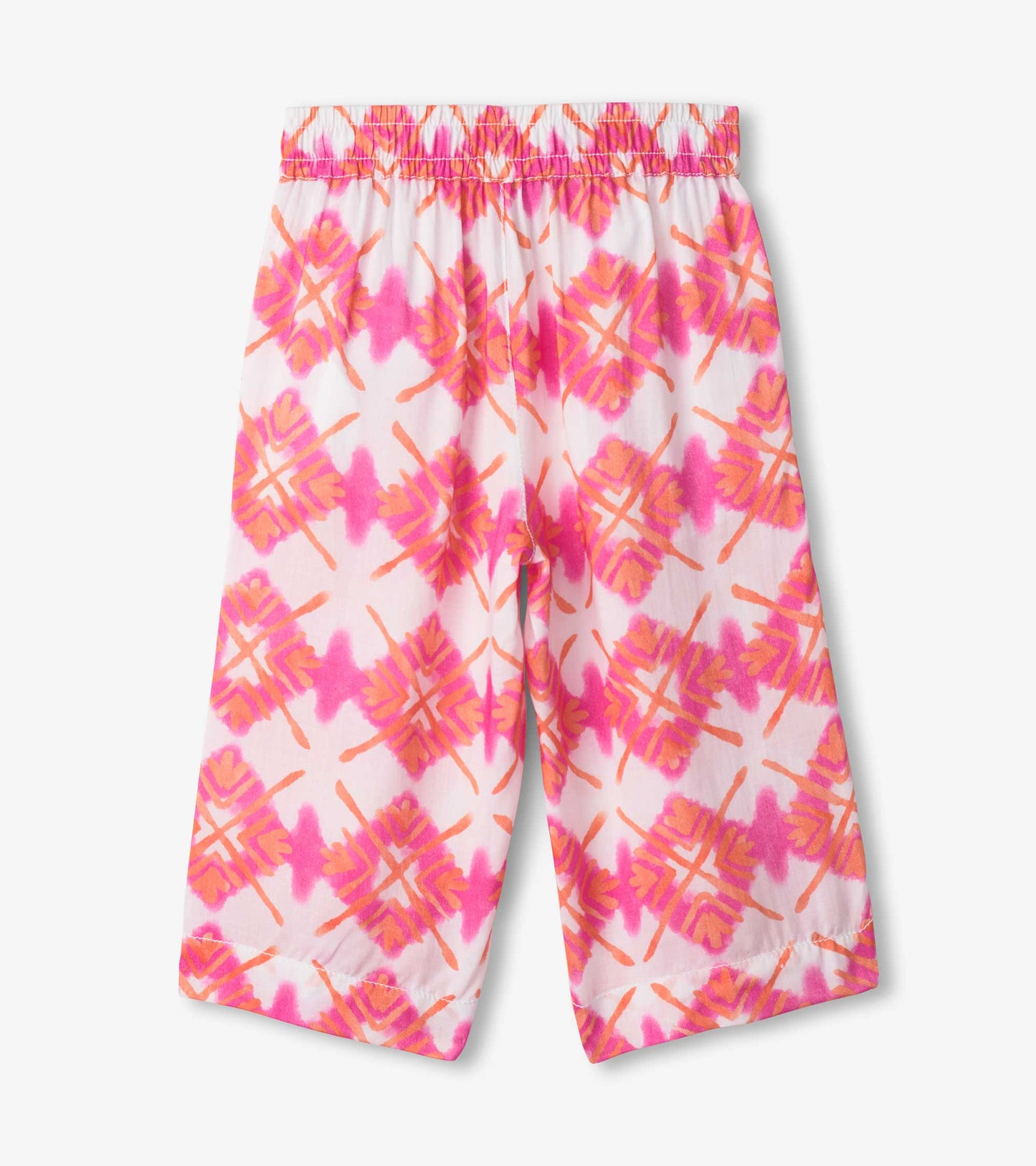 Cropped culottes in white with a pink and orange sunburst pattern, featuring an elastic waistband for comfort.